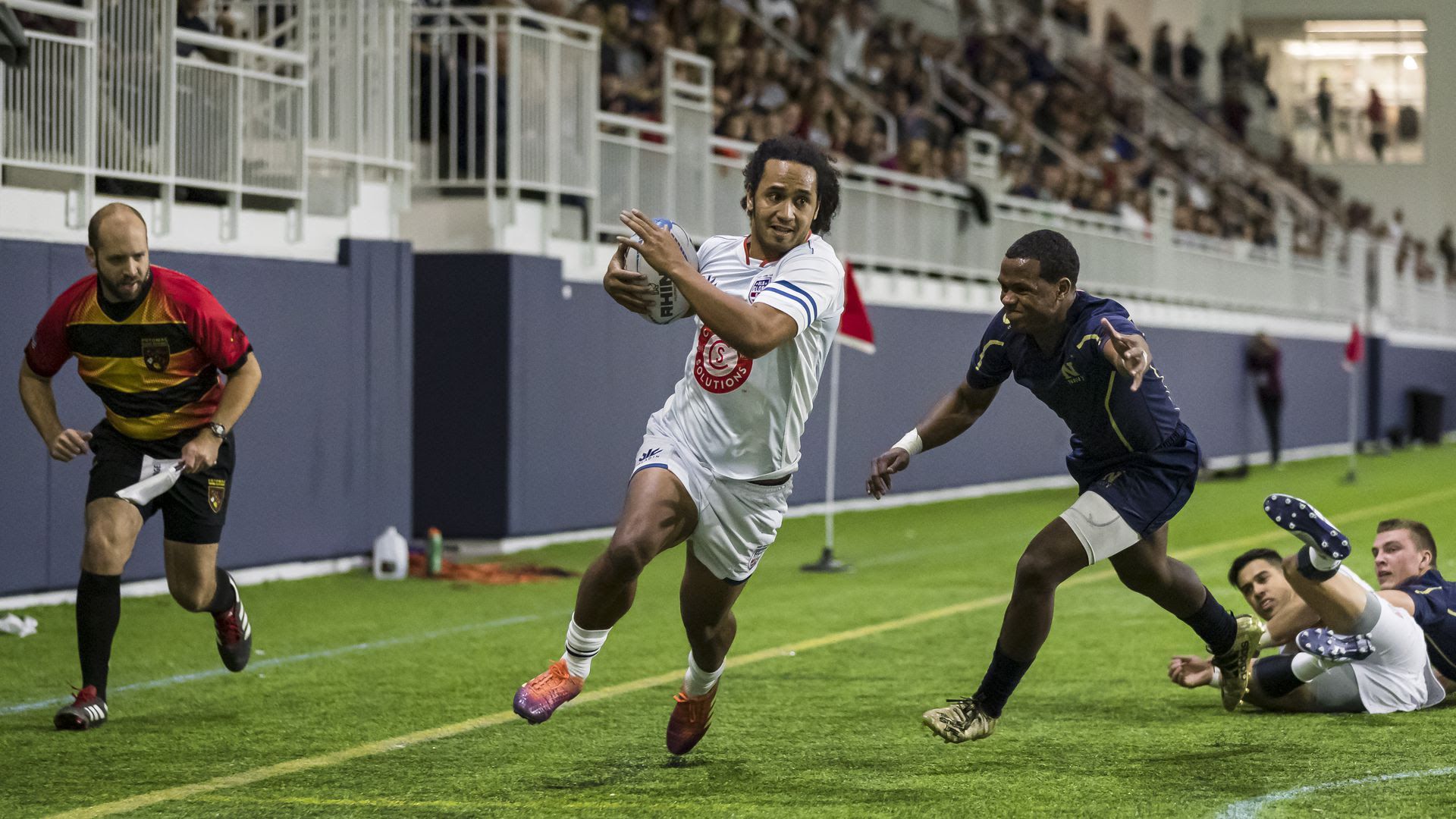 Vetekina Malafu of Old Glory DC scores a try in an exhibition match against Navy last month