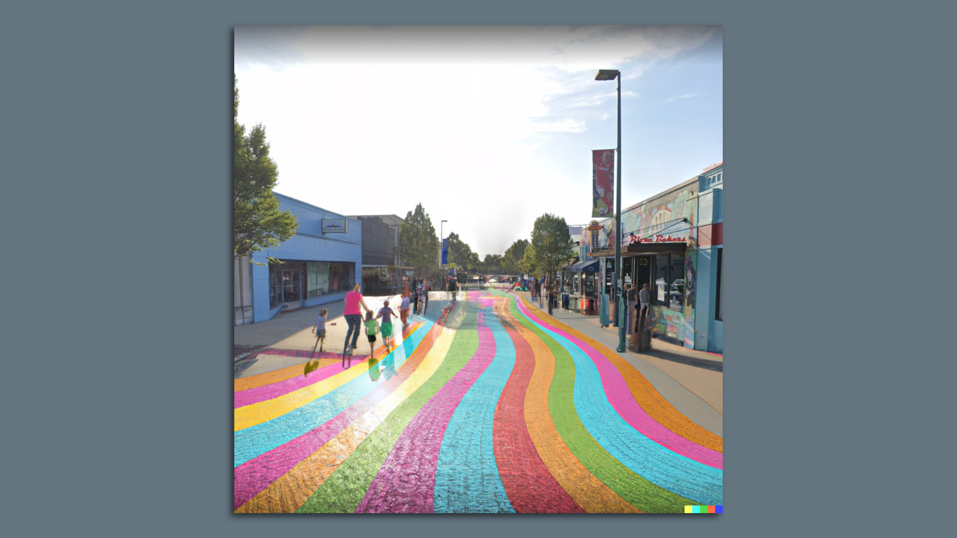 Carytown with no cars and a rainbow painted in the middle of the street