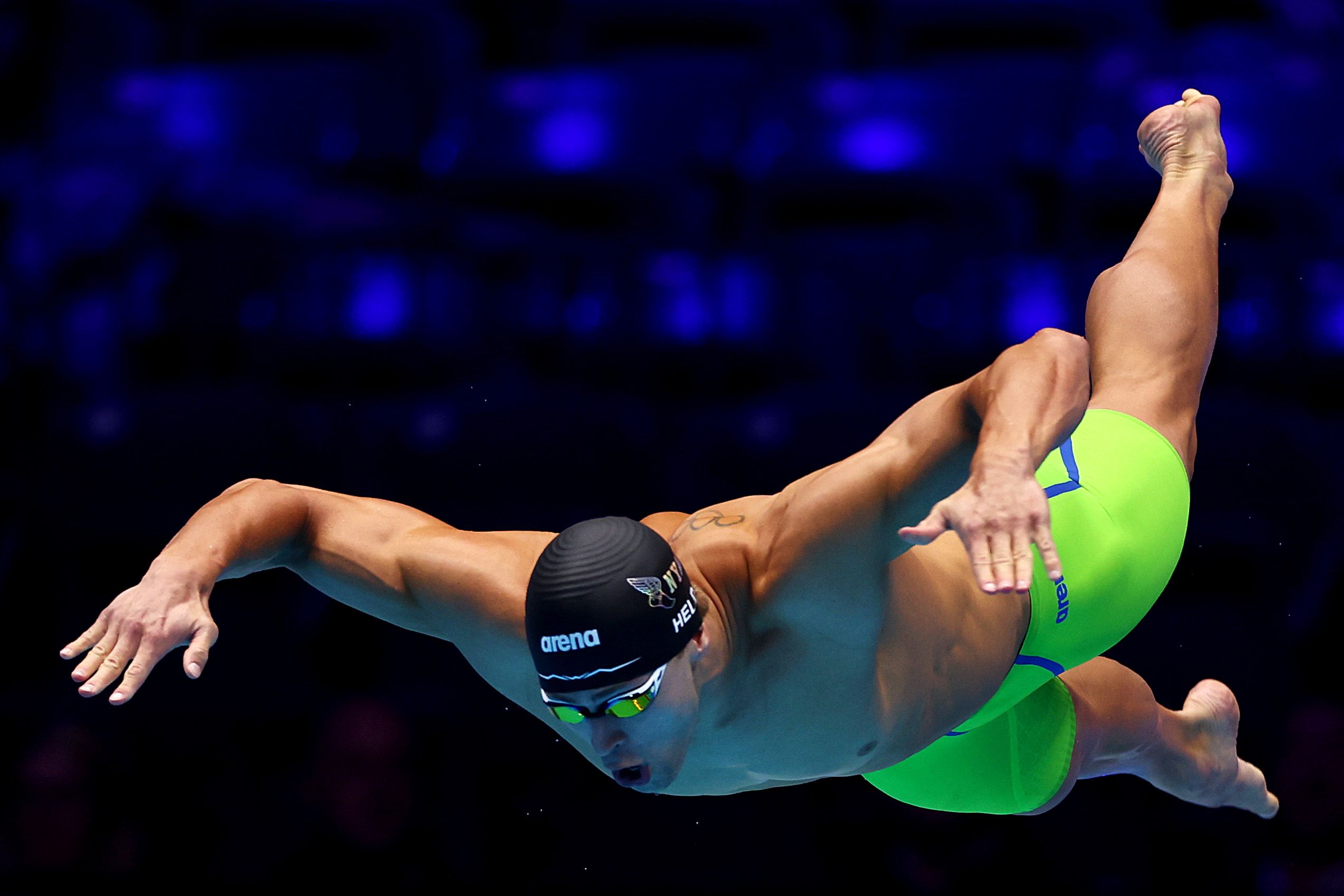 Ryan Held of the United States competes in the Men's 50m freestyle semifinal on Day Six of the 2024 U.S. Olympic Team Swimming Trials at Lucas Oil Stadium on June 20, 2024 in Indianapolis, Indiana. (Photo by Maddie Meyer/Getty Images)