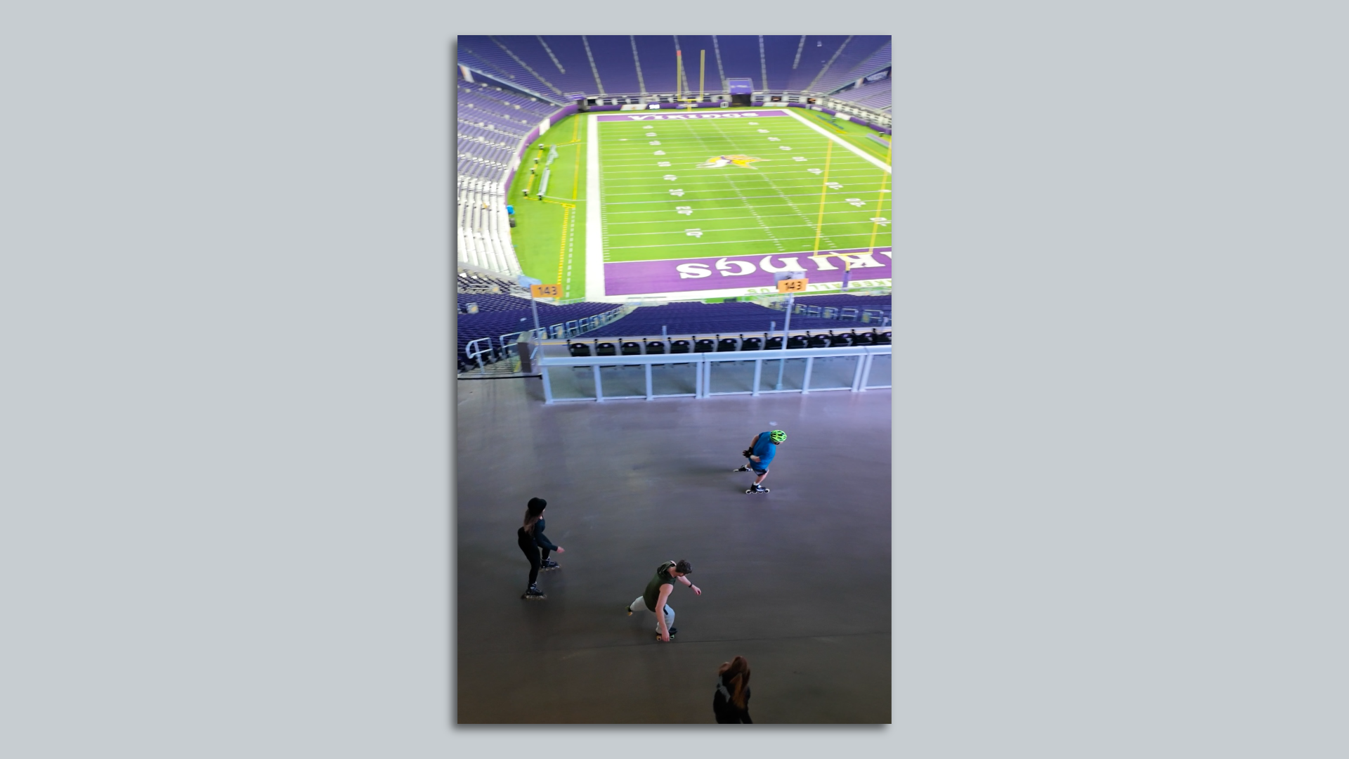 People rollerskating around US Bank Stadium.