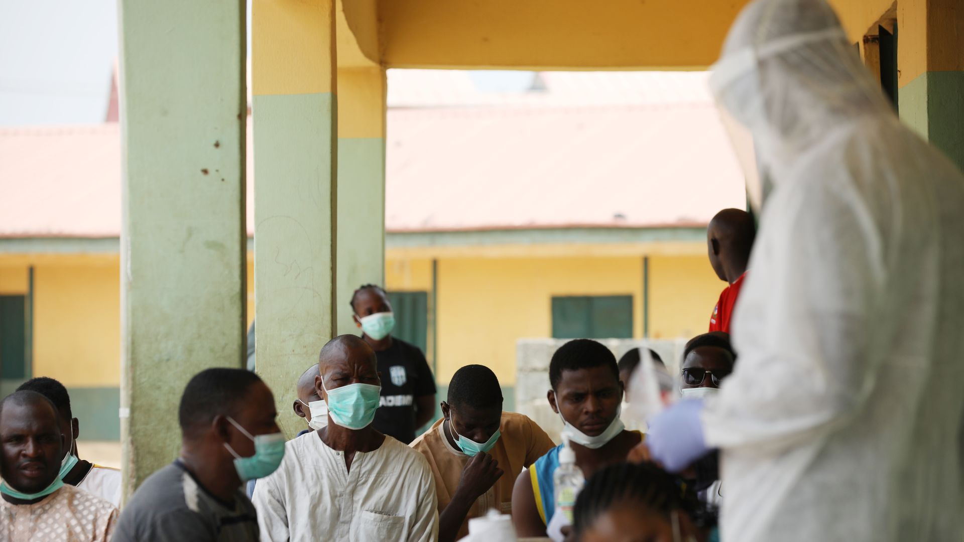 health workers prepare to take samples during a community COVID-19 coronavirus testing campaign