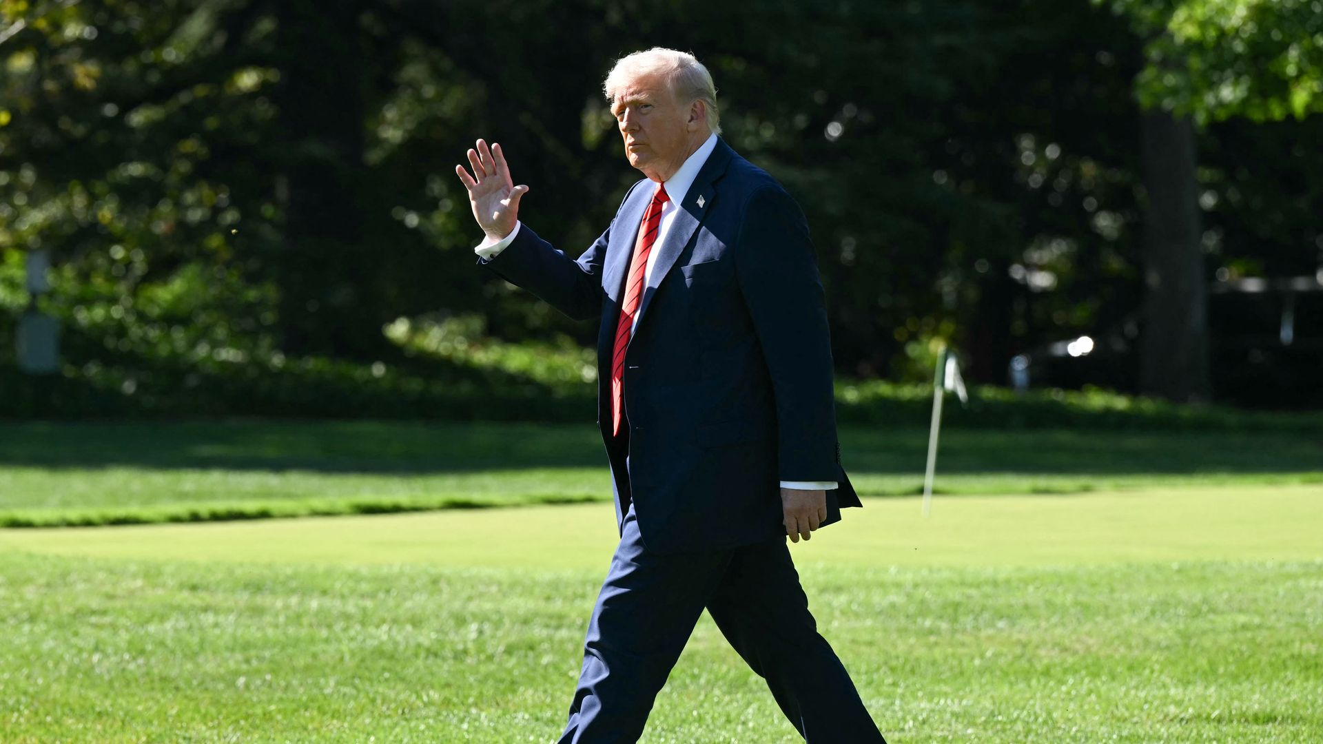 US President Donald Trump waves as he walks to Marine One on the South Lawn of the White House in Washington, DC, on October 10, 2025, on his way to Walter Reed National Military Medical Center to receive a medical checkup. (Photo by SAUL LOEB / AFP) (Photo by SAUL LOEB/AFP via Getty Images)