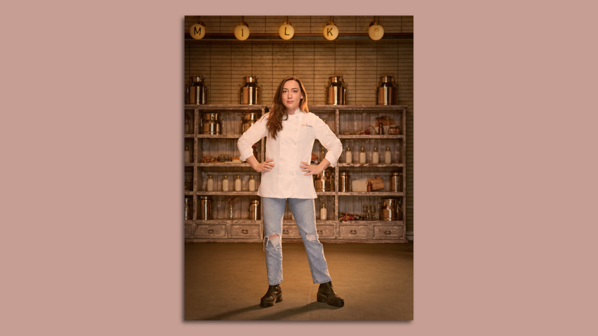 Savannah Miller, a chef, stands with her hands on her waist