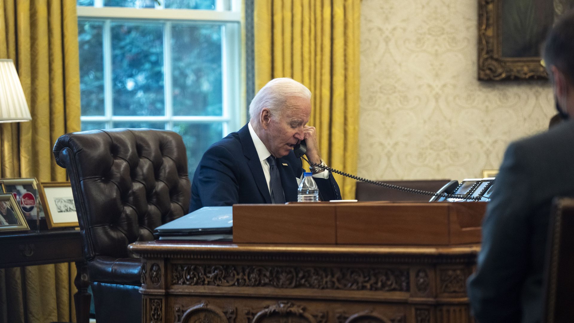 Biden speaks on the phone.