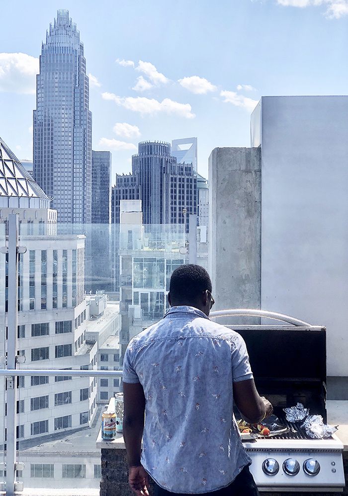 grilling rooftop apartment transplant city