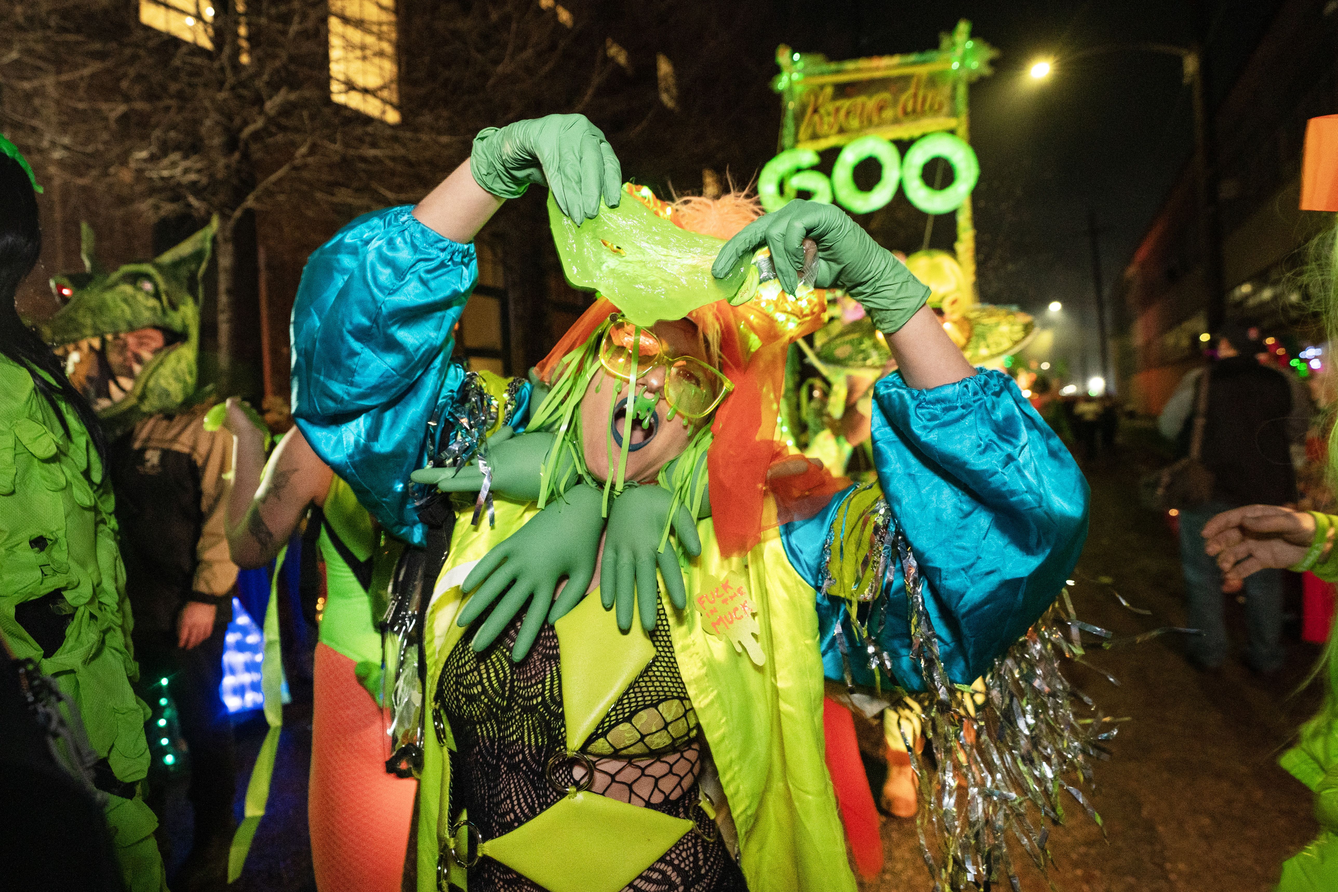 Photo shows a member walking in Krewe Boheme