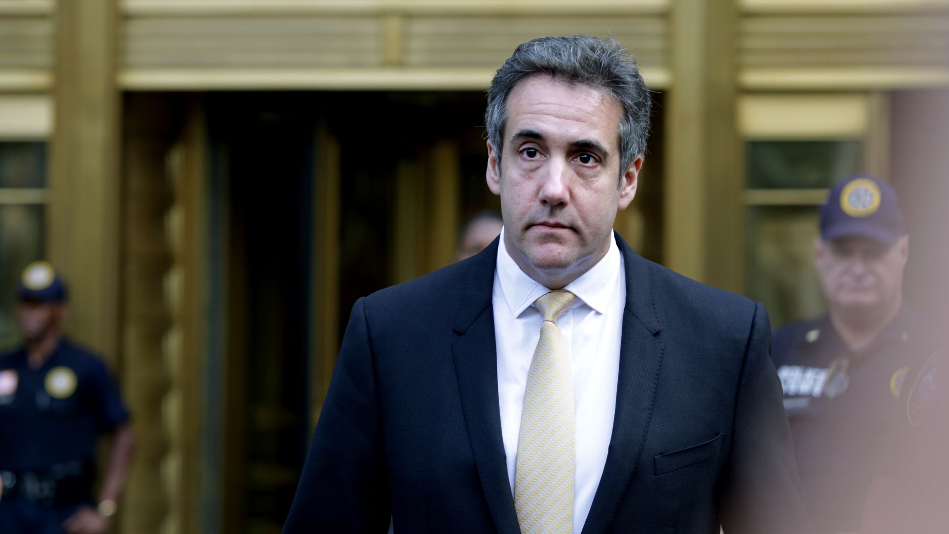 Michael Cohen, former lawyer to President Trump, exits the Federal Courthouse on Tuesday. Photo: Yana Paskova/Getty Images