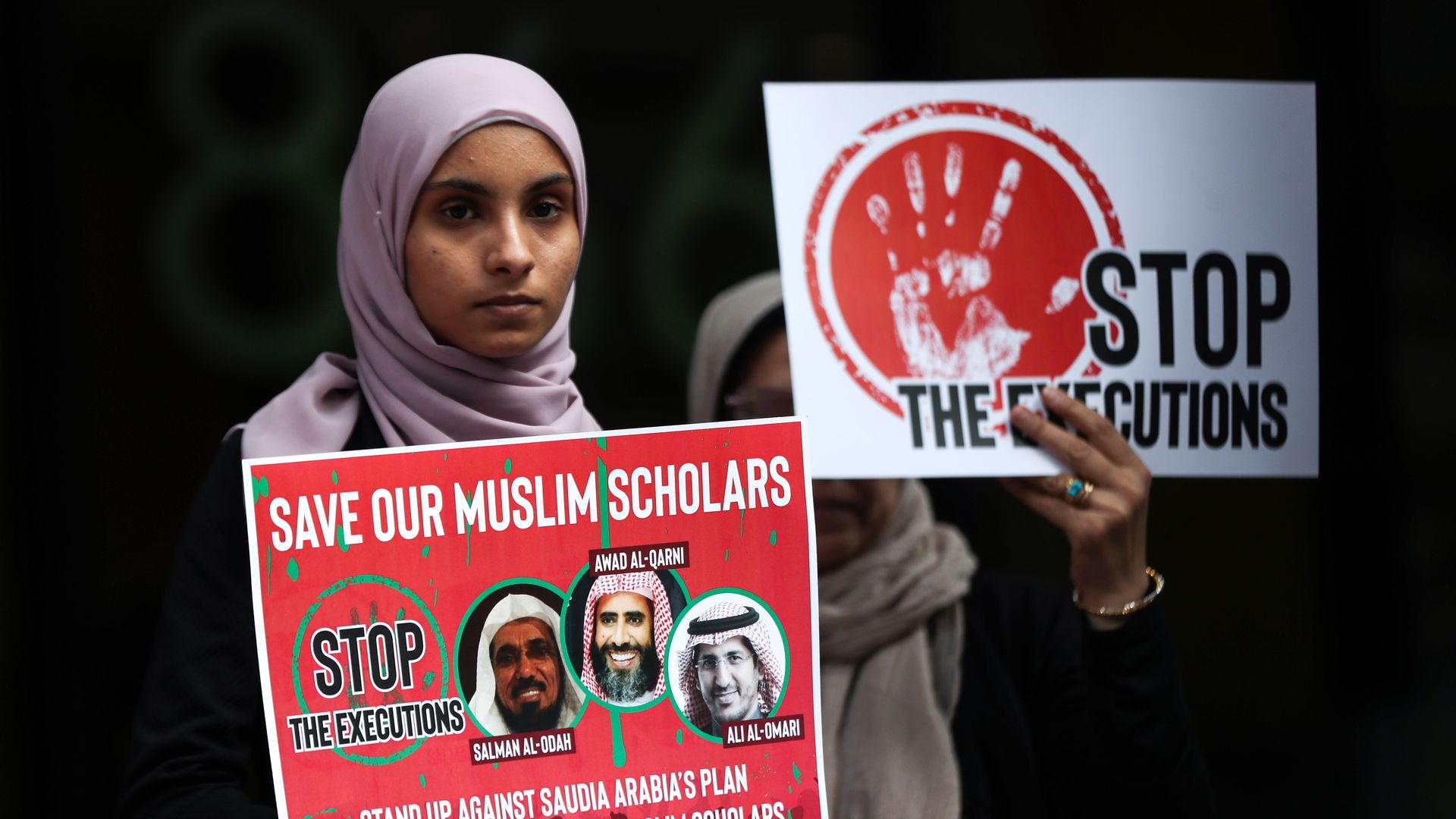 People gather in front of Saudi Consulate in New York to protest against Saudi Arabia's decision to execute three leading Saudi Arabian scholars