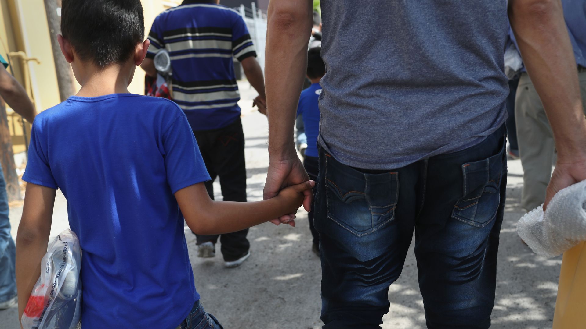 Central American immigrant families depart ICE custody, pending future immigration court hearings on June 11, 2018 in McAllen, Texas. 