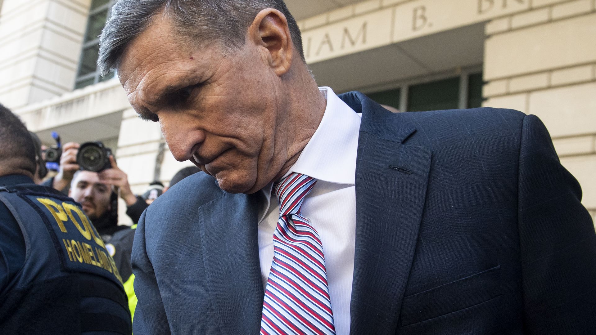 Former National Security Advisor General Michael Flynn leaves after the delay in his sentencing hearing