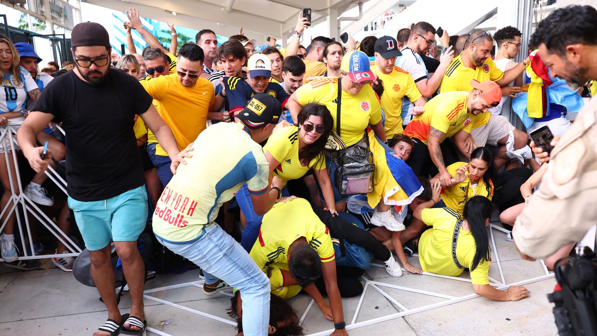 MIAMI GARDENS, FLORIDA - JULY 14: Fans try to enter the stadium amid disturbances prior to the CONMEBOL Copa America 2024 Final match between Argentina and Colombia at Hard Rock Stadium on July 14, 2024 in Miami Gardens, Florida. (Photo by Maddie Meyer/Getty Images)
