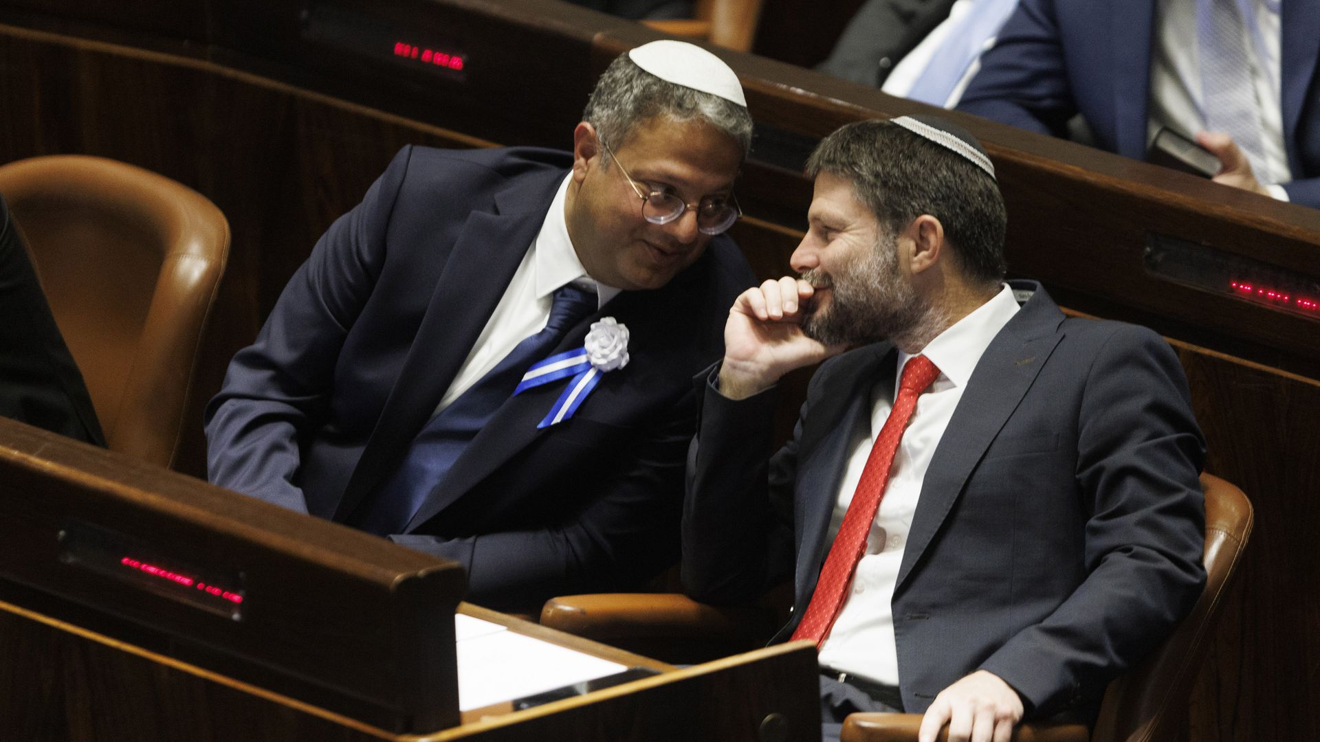 Itmar Ben Gvir and Bezalel Smotrich talk in the Knesset on Nov. 15. Photo: Kobi Wolf/Bloomberg via Getty Images