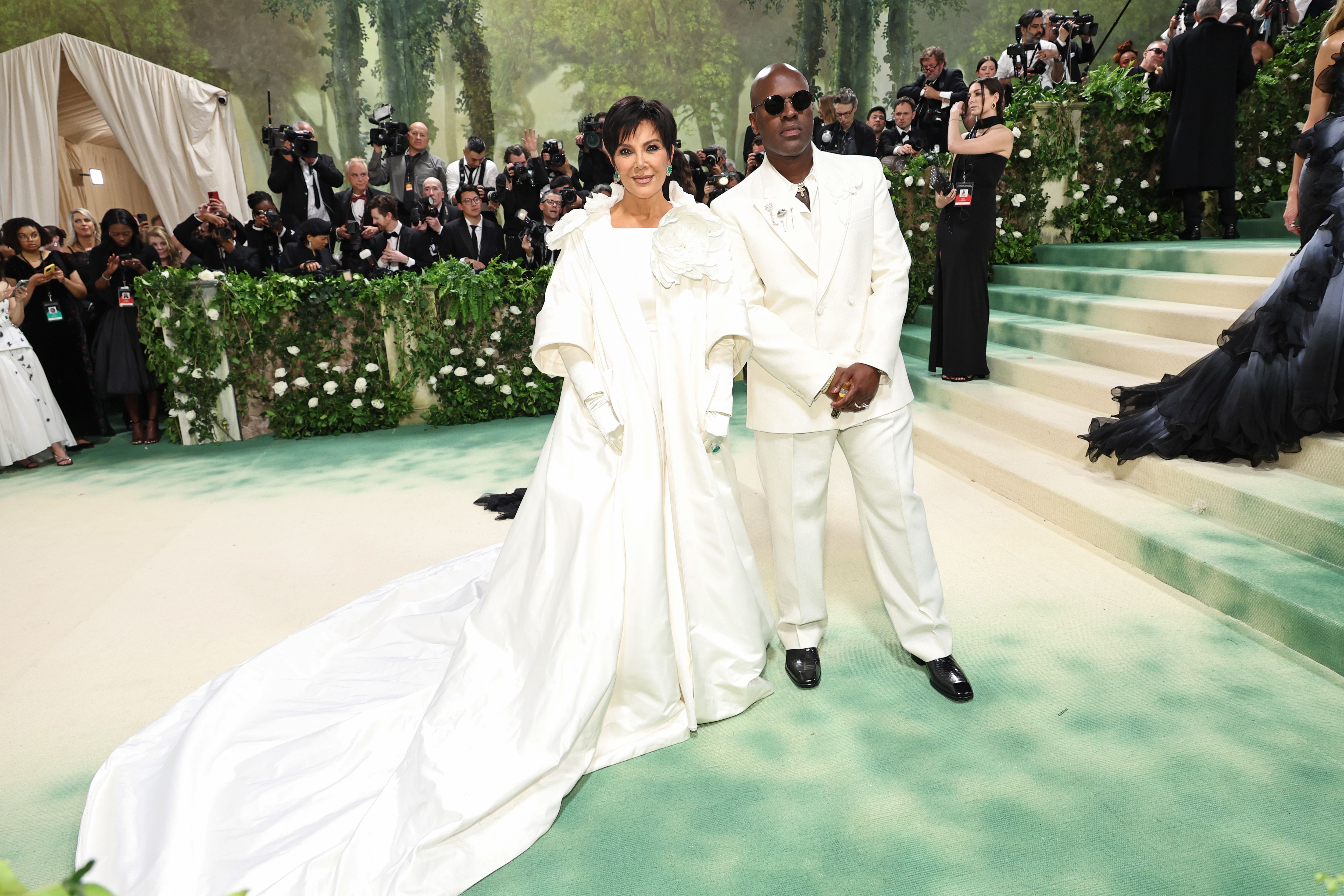 (L-R) Kris Jenner and Corey Gamble attend The 2024 Met Gala Celebrating "Sleeping Beauties: Reawakening Fashion" at The Metropolitan Museum of Art on May 06, 2024 in New York City. (Photo by Jamie McCarthy/Getty Images)