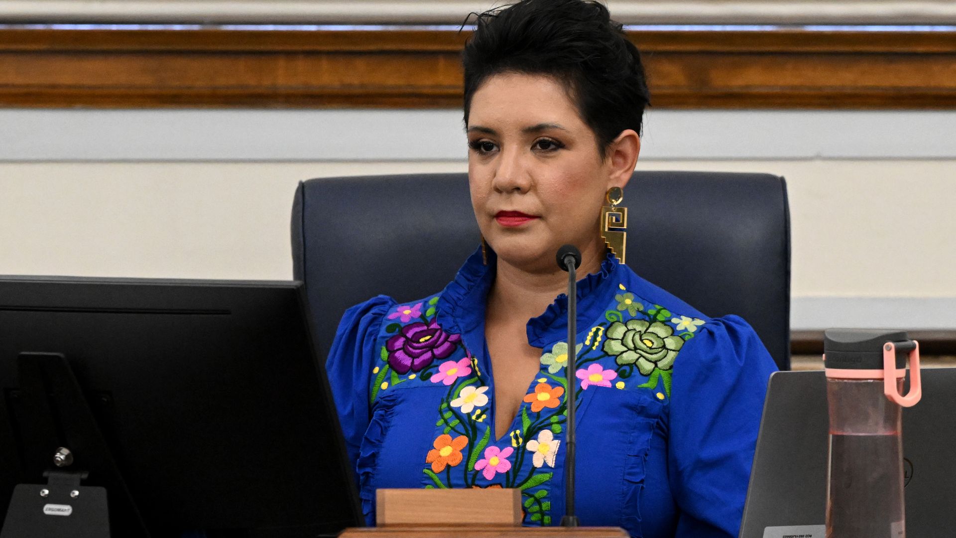 Denver council member Flor Alvidrez sits on the dais of the City Council during a legislative meeting.