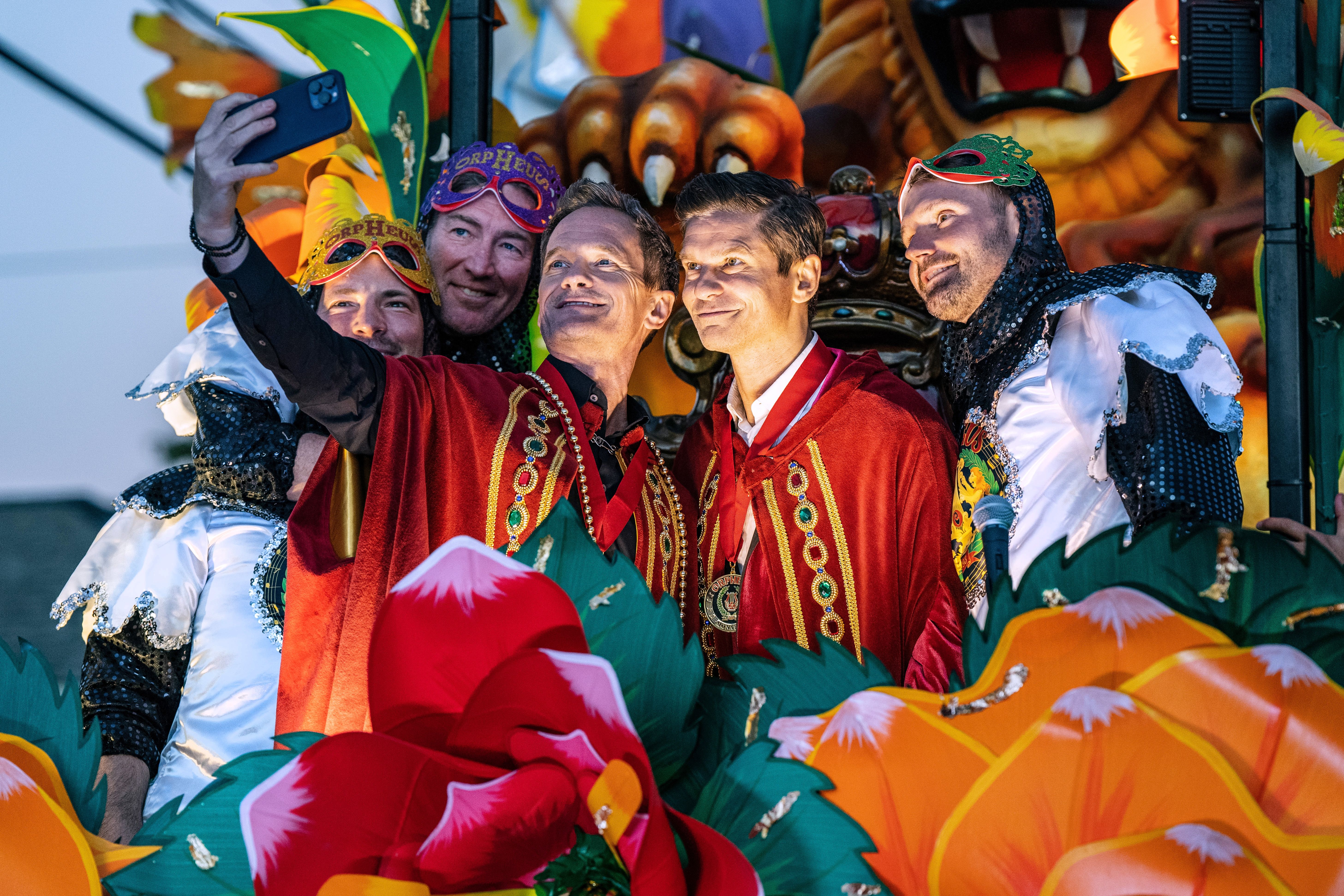 Photo shows Neil Patrick Harris on a float in the Krewe of Orpheus