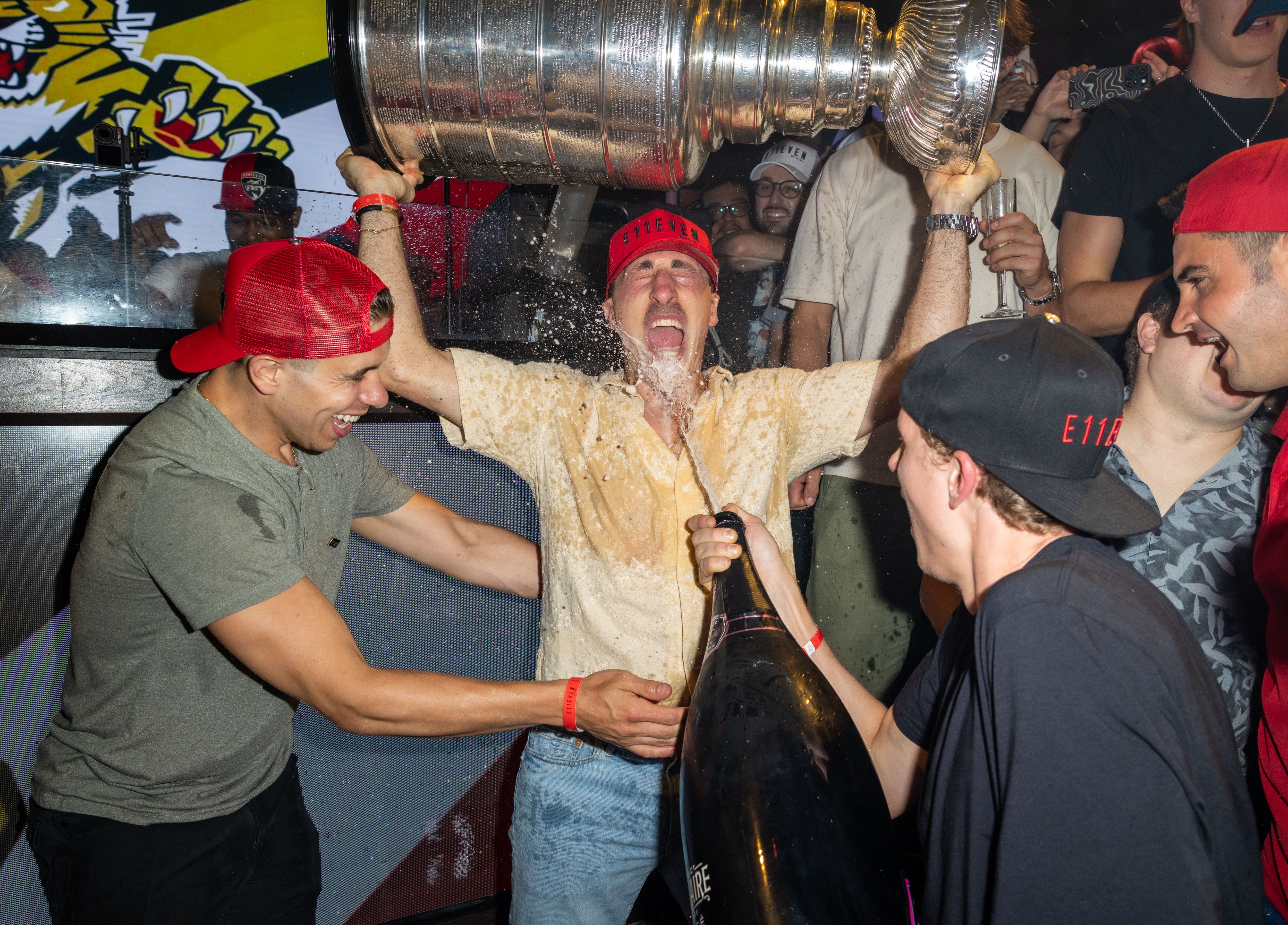 MIAMI, FLORIDA - JUNE 19: Evan Rodrigues, Brad Marchand and Niko Mikkola of the Florida Panthers are seen celebrating the 2025 Stanley Cup win at E11EVEN Miami on June 19, 2025 in Miami, Florida. (Photo by Alexander Tamargo/Getty Images for E11EVEN)
