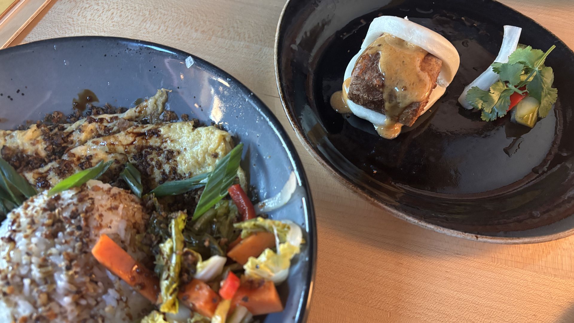 A rice bowl and a tofu steamed bun