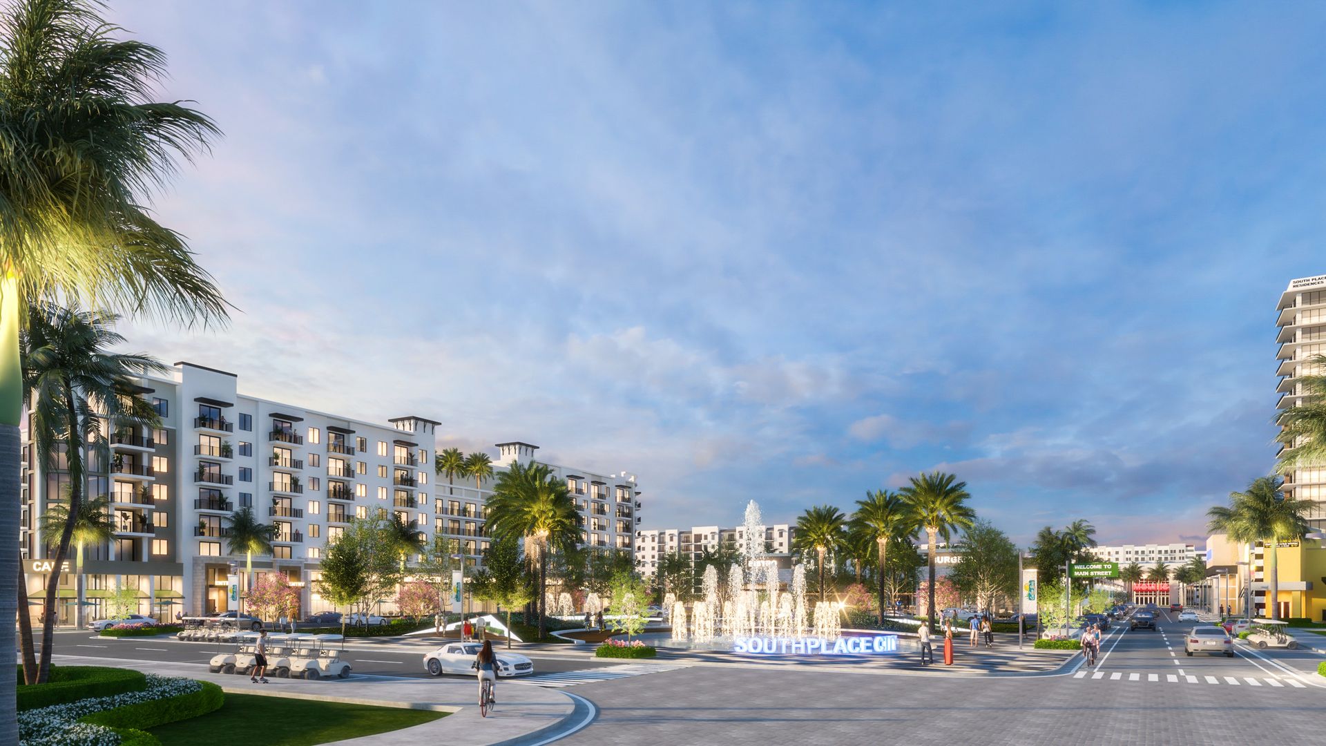Apartment buildings about ten stories high are shown at dusk with palm trees beside them.