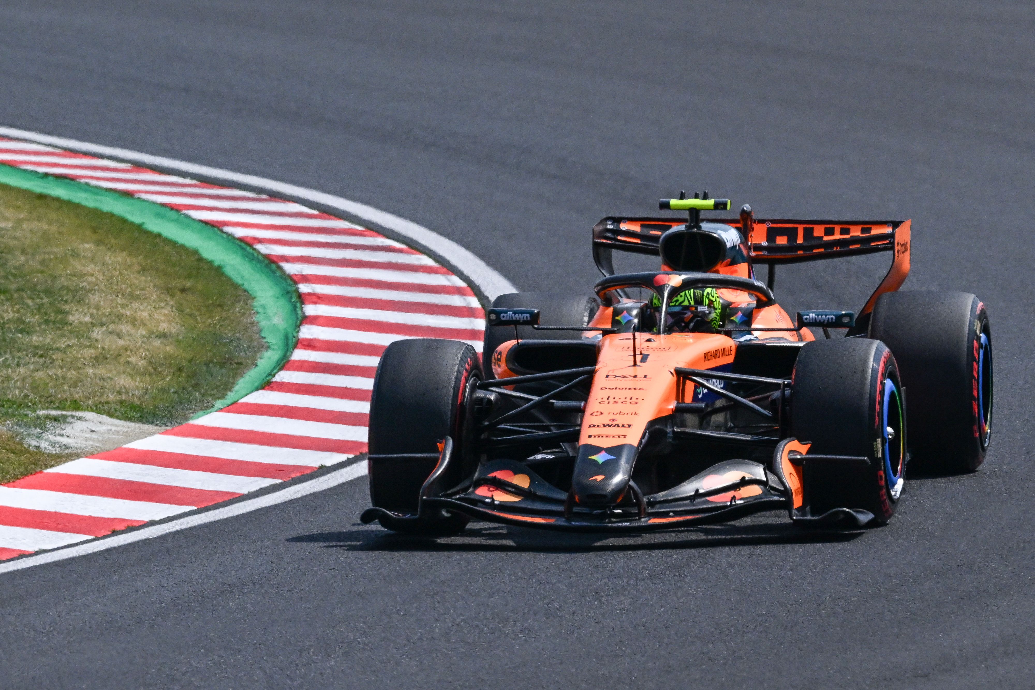 SUZUKA, JAPAN - MARCH 28: Reigning World Champion Lando Norris of the McLaren F1 Team drives during the third practice session ahead of the 2026 Japanese Grand Prix at Suzuka Circuit in Suzuka, Mie Prefecture, Japan, on March 28, 2026. (Photo by Artur Widak/NurPhoto via Getty Images)
