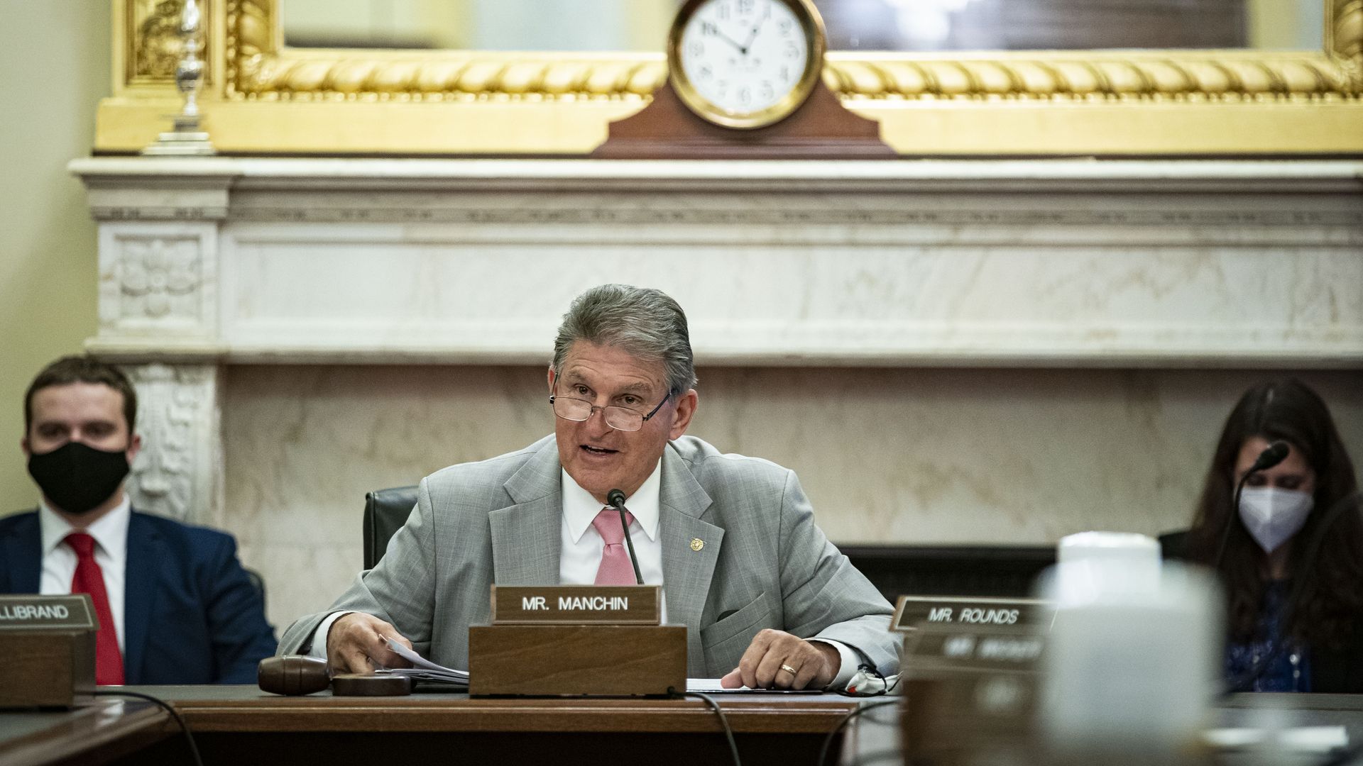 Photo of Joe Manchin sitting during a hearing
