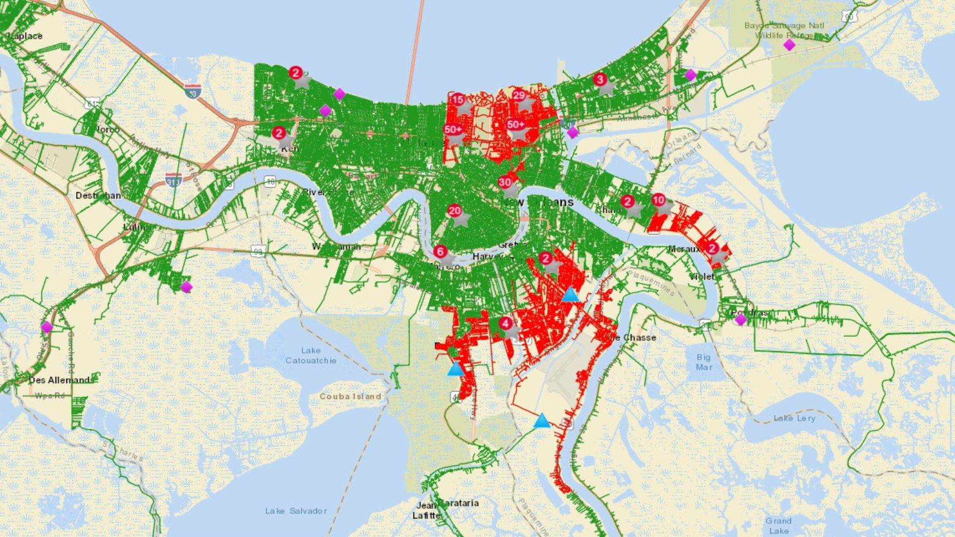 Map of New Orleans showing power outages in red and areas with power in green.