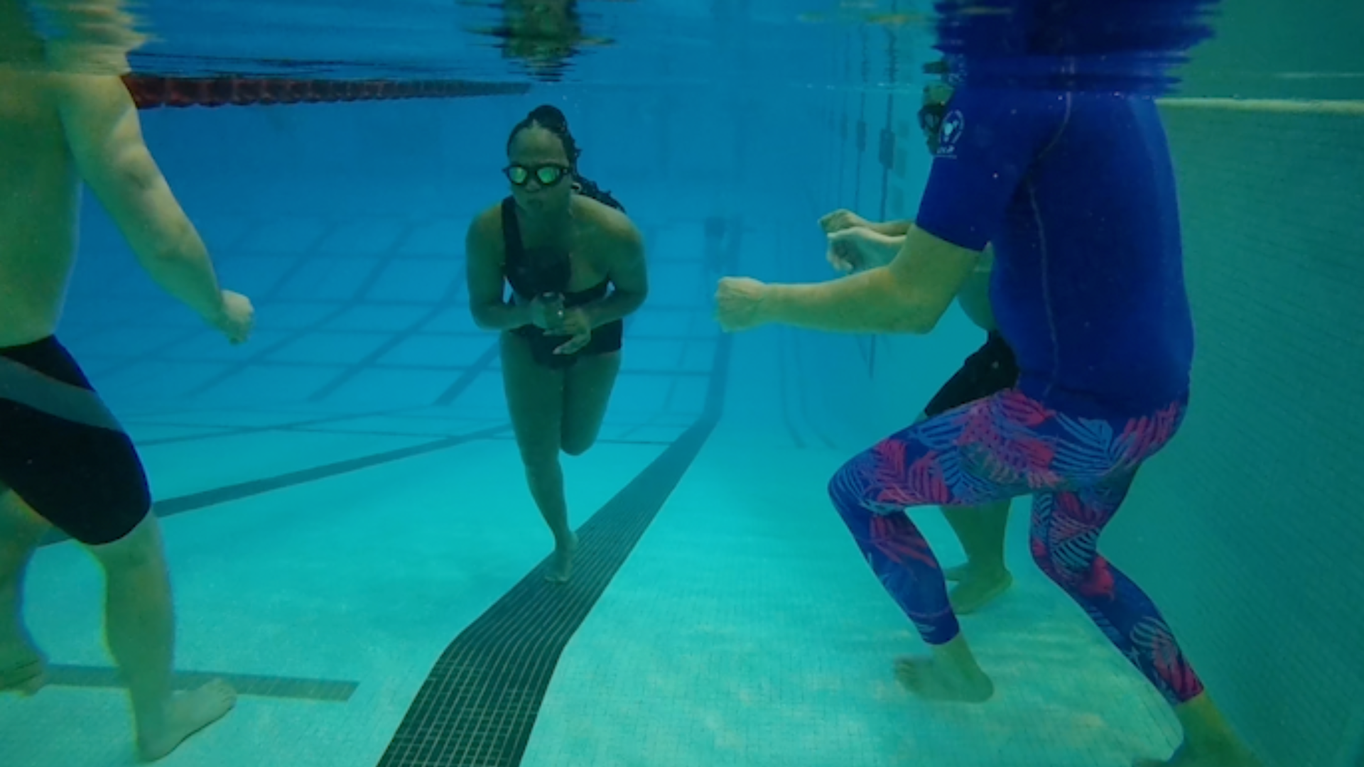 Moyo under water at UIC Natatorium. 