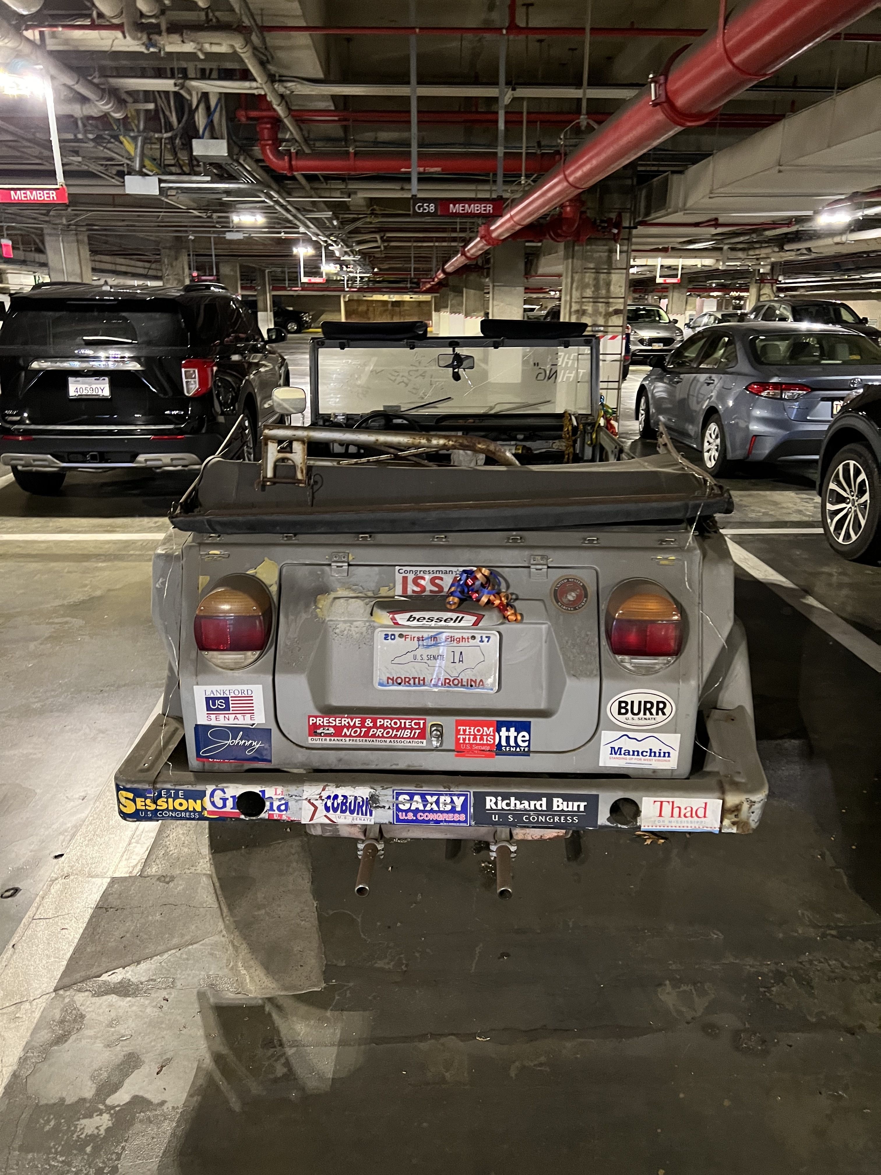 The back of Senator Richard Burr's Volkswagen, with lots of bumper stickers