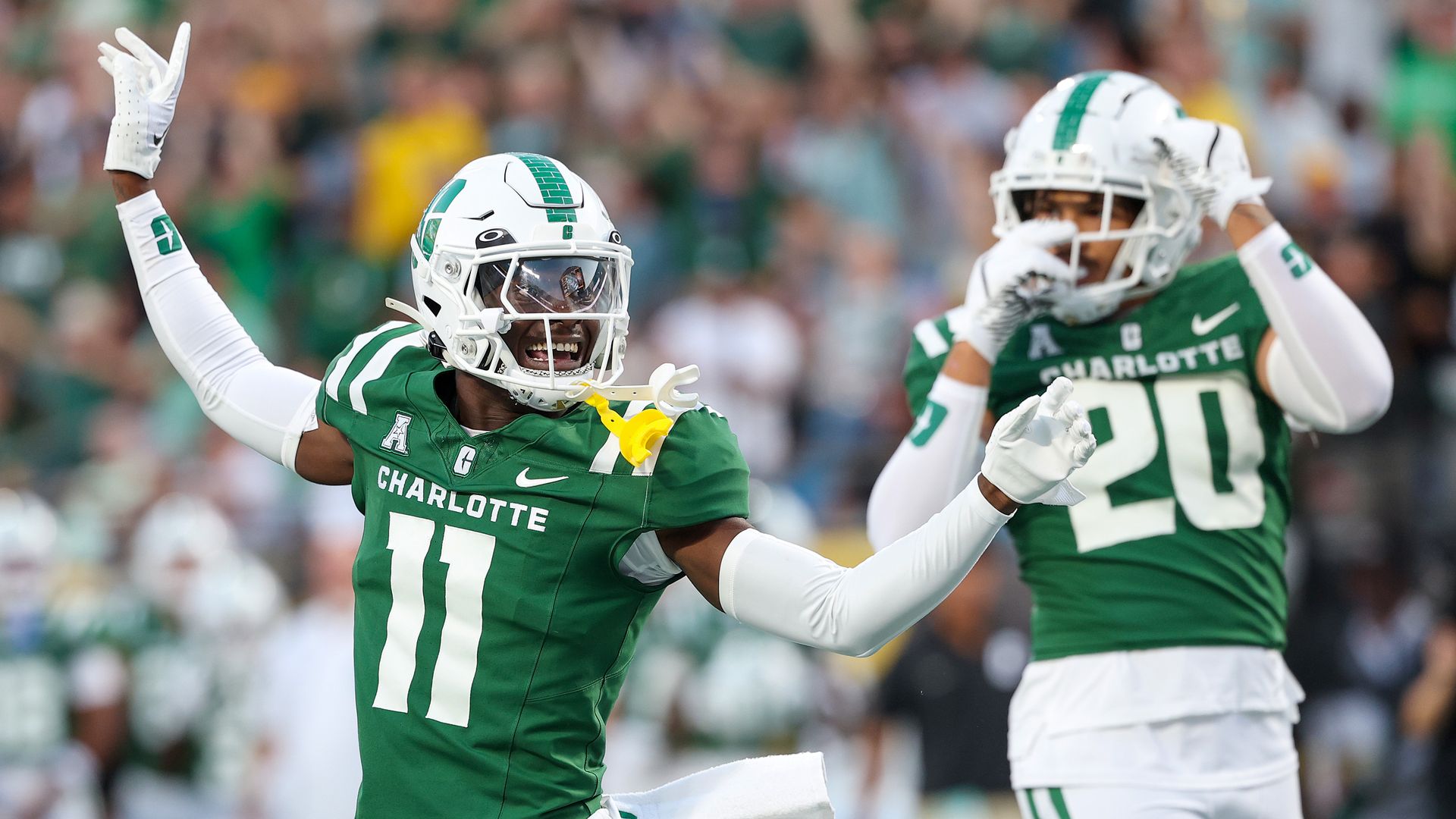 Charlotte 49ers football stadium packed with fans celebrating record ticket revenue