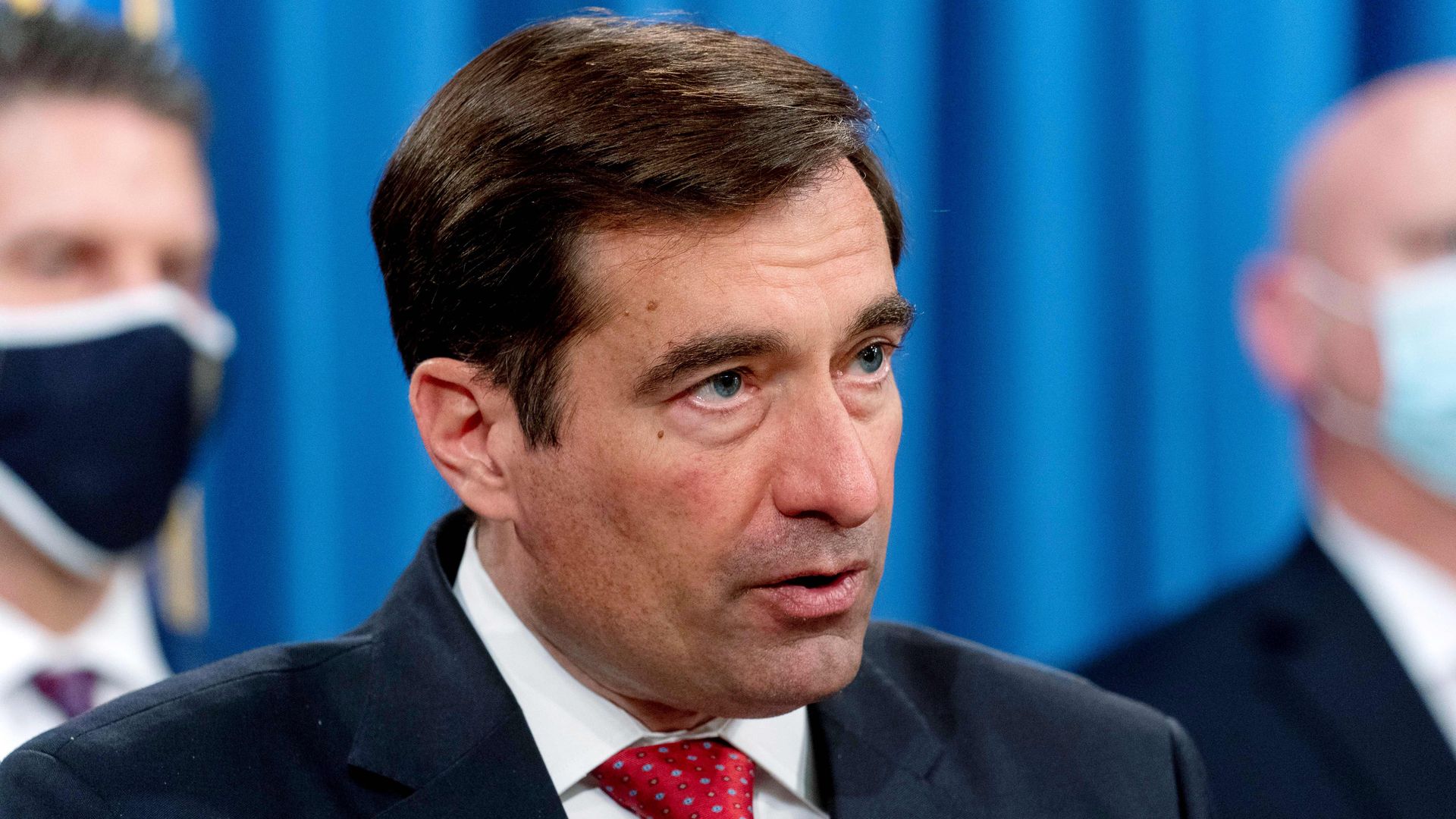 Assistant Attorney General for the National Security Division John Demers speaks at a news conference