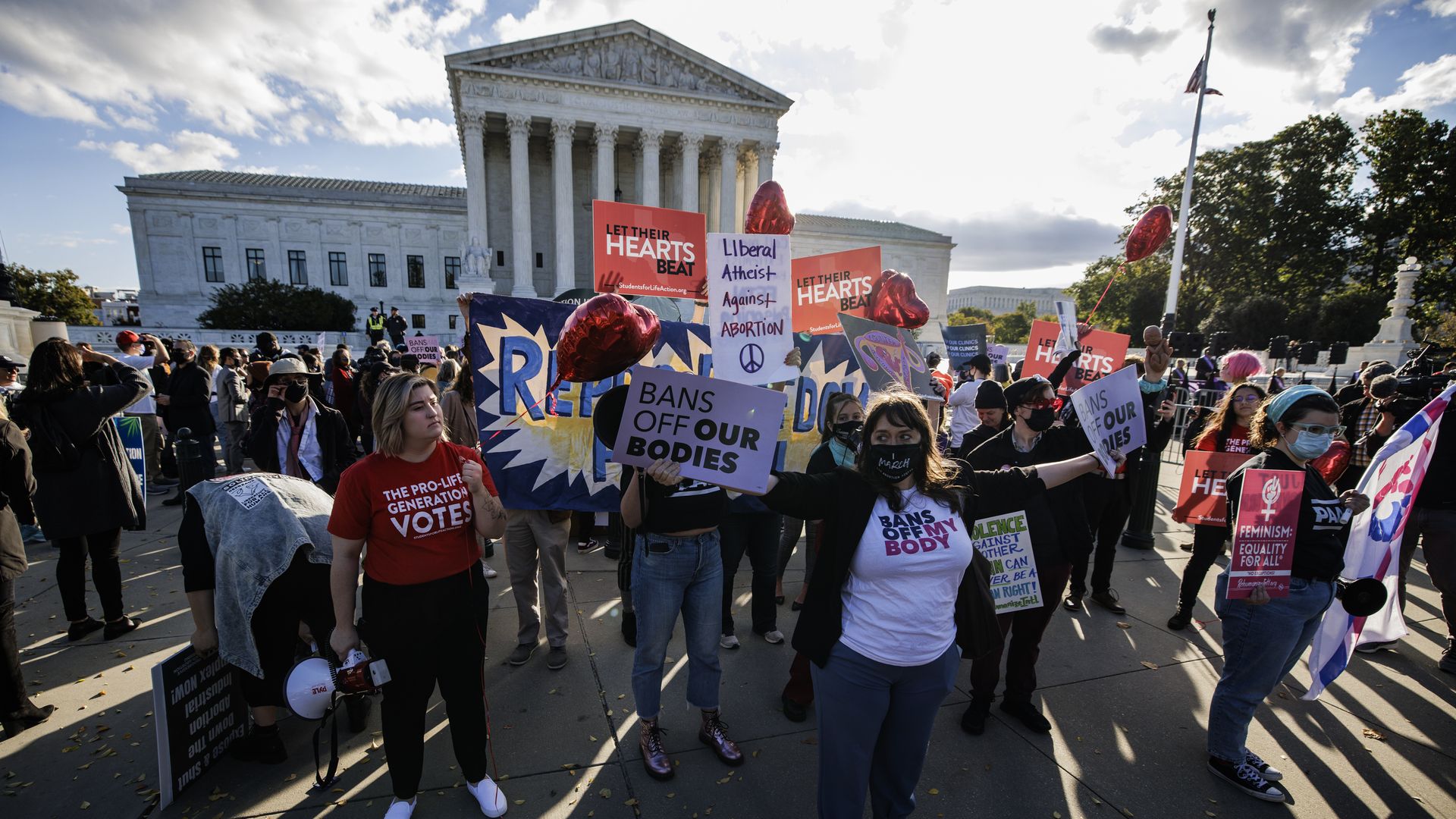Pro-life and pro-choice demonstrators outside of the U.S. Supreme Court in Washington, D.C., U.S., on Monday, Nov. 1, 2021.