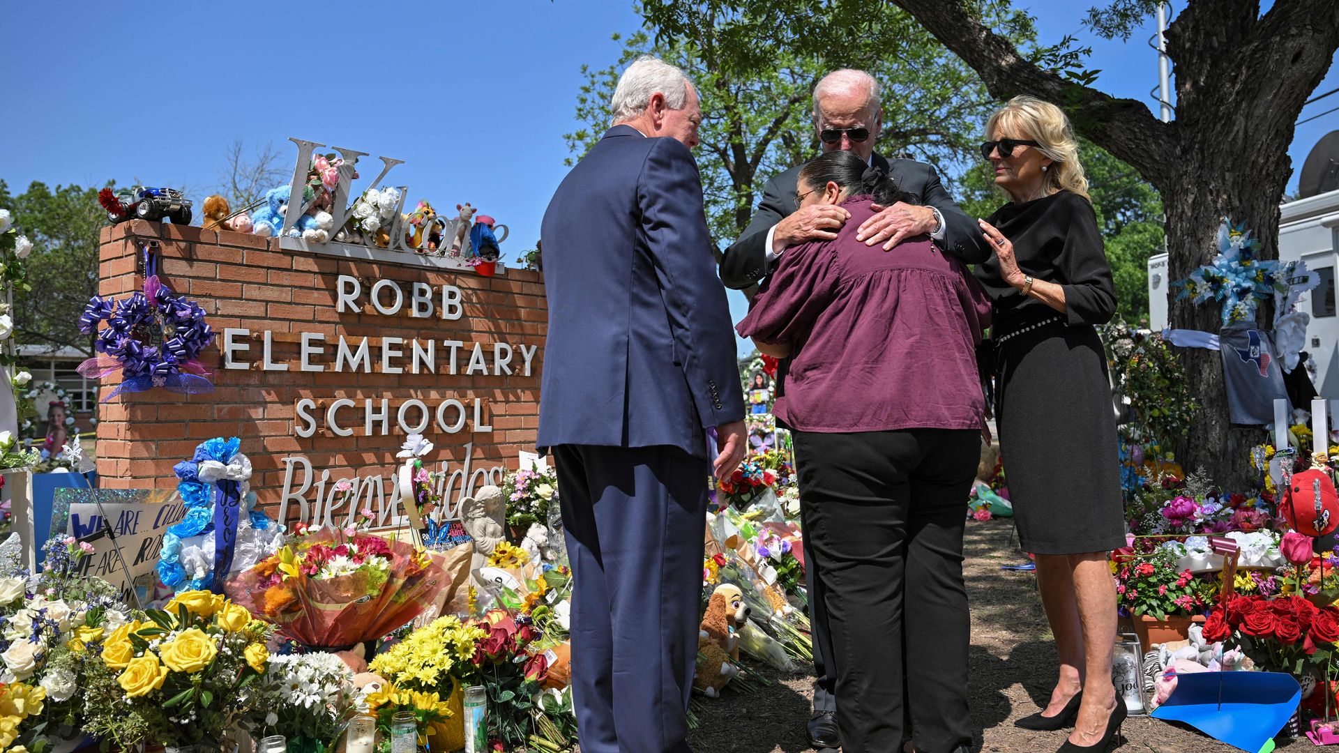 Joe Biden and Jill Biden consoling the principal of Robb Elementary