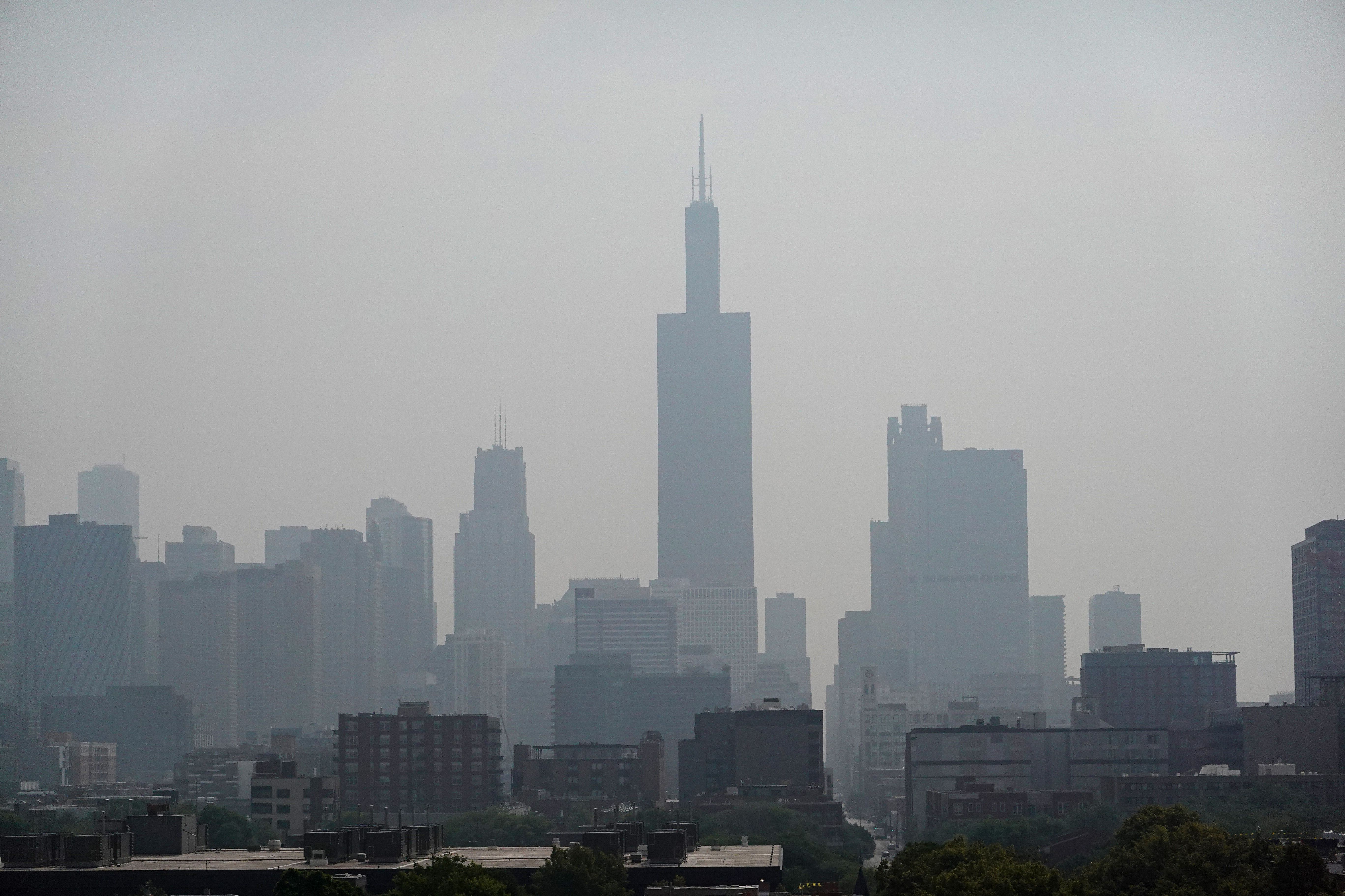 Wildfire smoke obscures the view of the skyline on June 29, 2023 in Chicago, Illinois. The Chicago area is under an air quality alert as smoke from Canadian wildfires has covered the city for a third day in a row. 