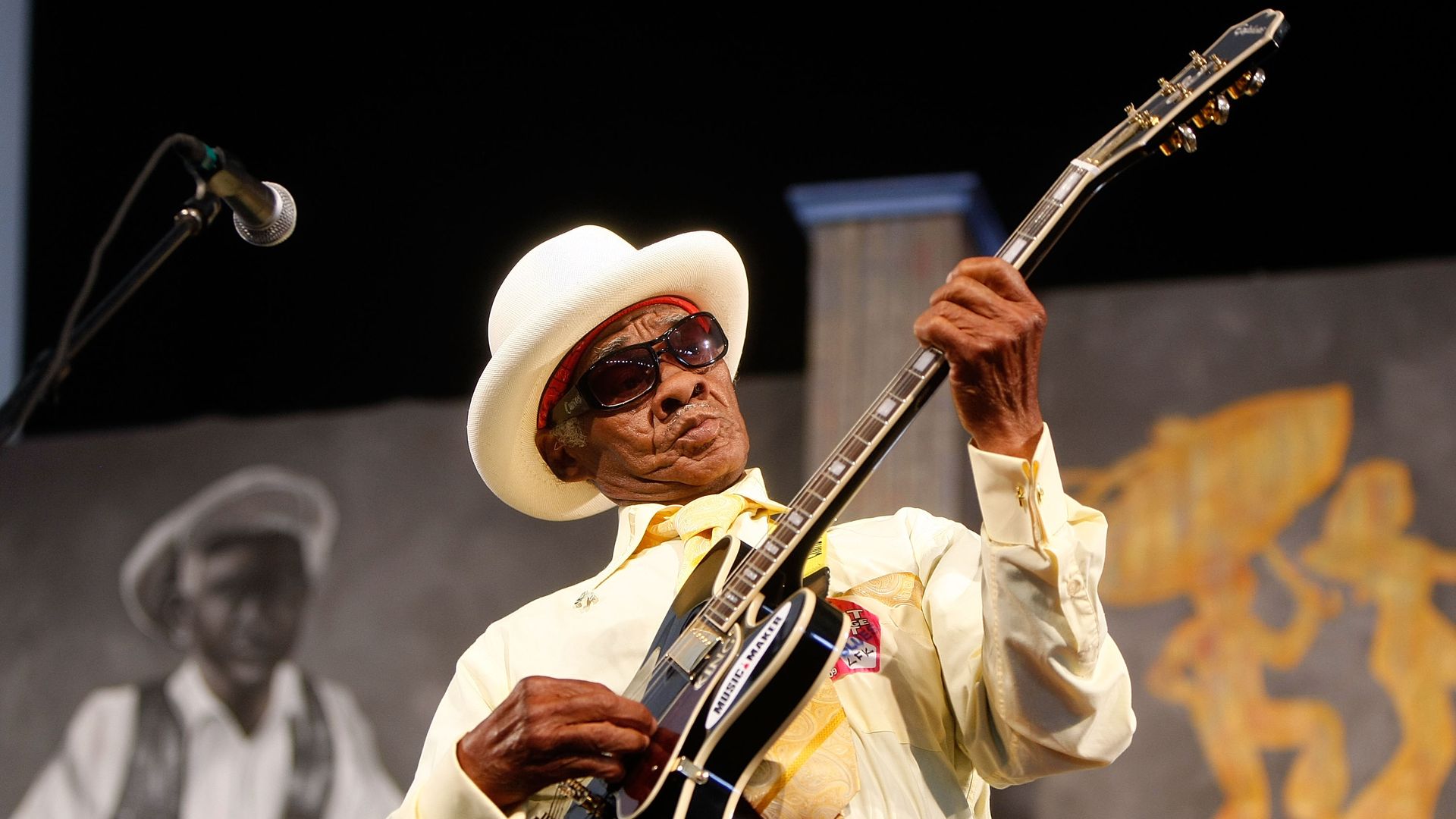 Little Freddie King holds his guitar as he performs at Jazz Fest.