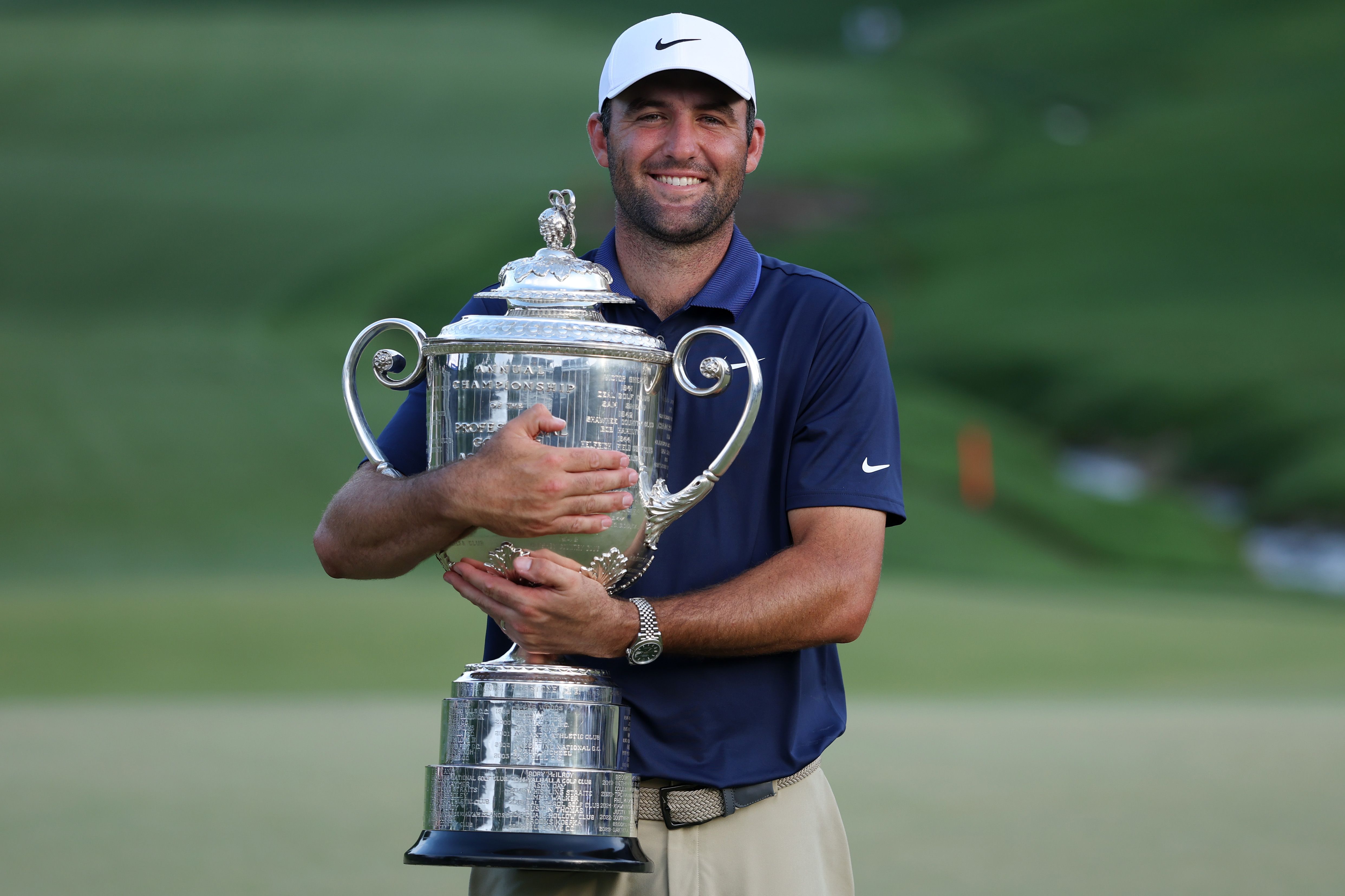 Scottie Scheffler of the United States celebrates with the Wanamaker Trophy after winning the 2025 PGA Championship at Quail Hollow Country Club on May 18, 2025 in Charlotte, North Carolina. (Photo by Warren Little/Getty Images)