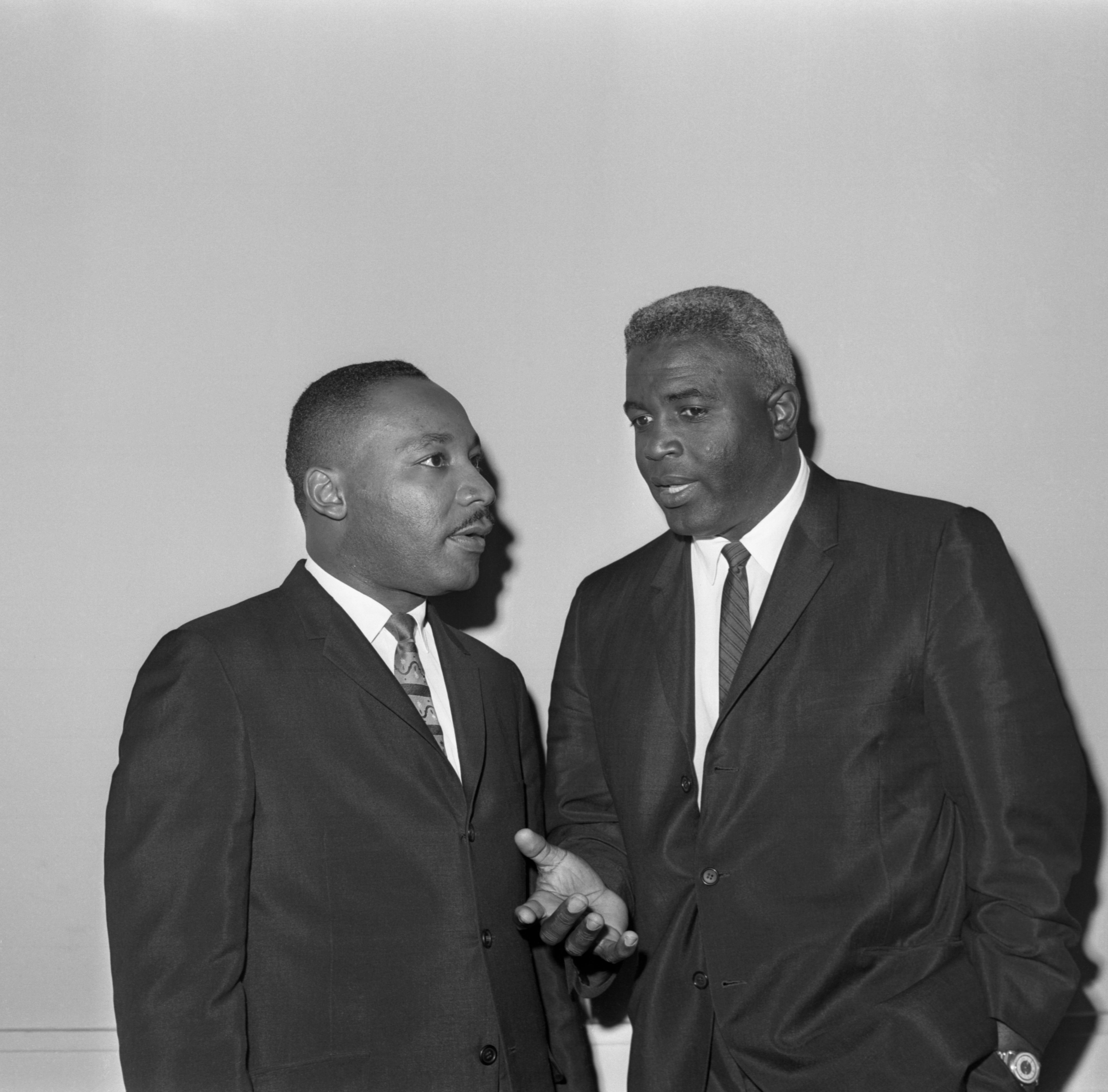 Martin Luther King Jr. in conversation with Jackie Robinson  in 1962.