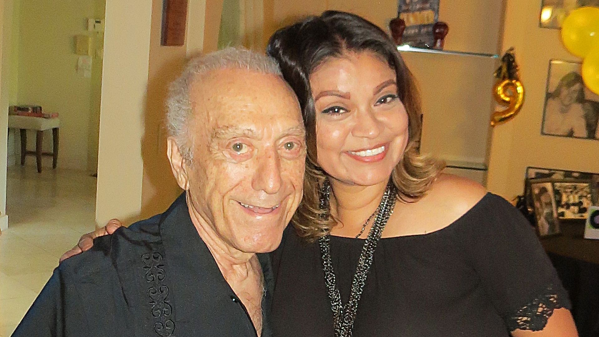 The late Art Laboe and Rebecca Luna, aka "Old School Becky Lu," pose for a photo in 2019.