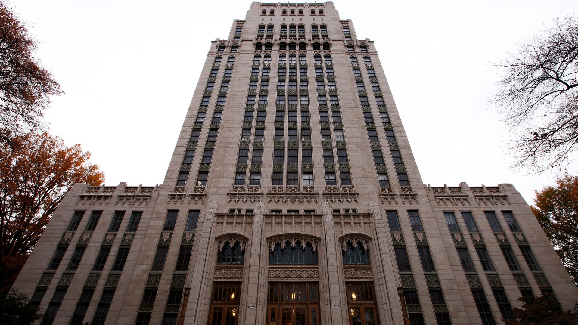 A view of Atlanta City Hall looking towards the sky.