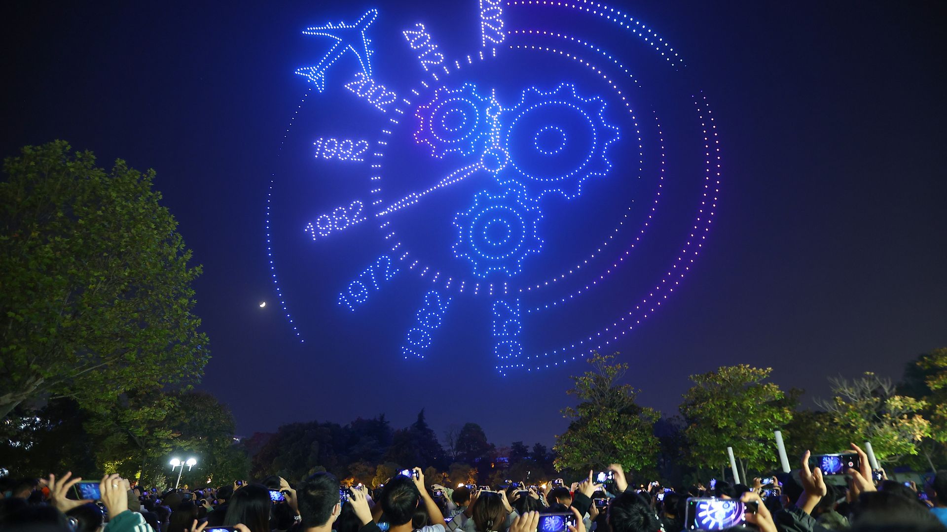 Drones form a pattern during a light show to celebrate the 70th founding anniversary of Nanjing University of Aeronautics and Astronautics on October 30, 2022 in Nanjing, Jiangsu Province of China.