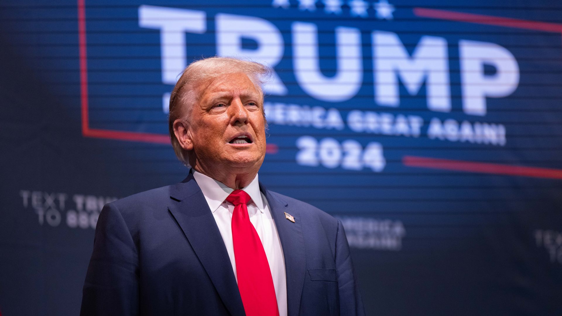 Republican presidential candidate former President Donald Trump takes the stage to speak on October 9, 2023 in Wolfeboro, New Hampshire. 