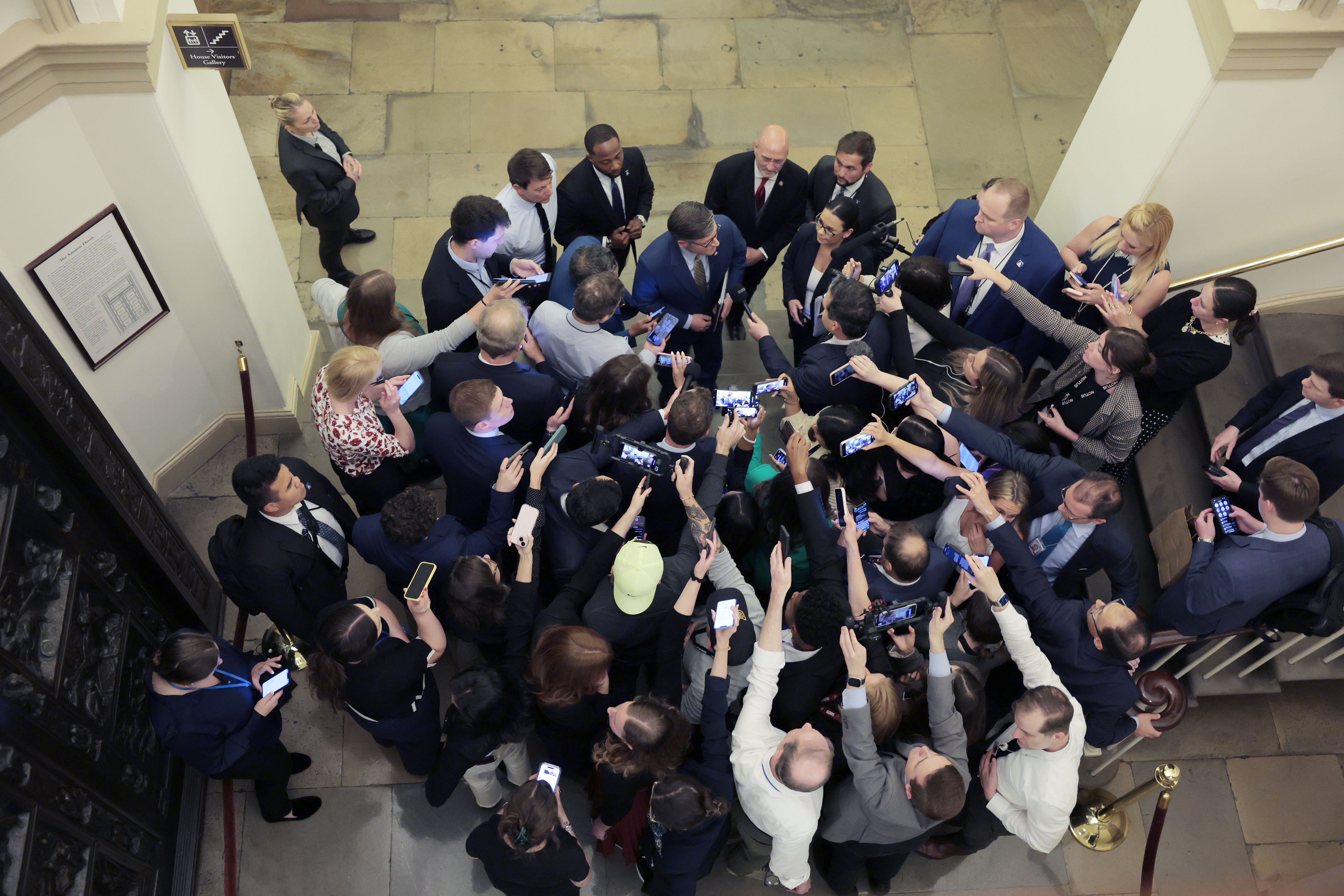U.S. Speaker Mike Johnson talks with reporters yesterday in Washington, D.C.