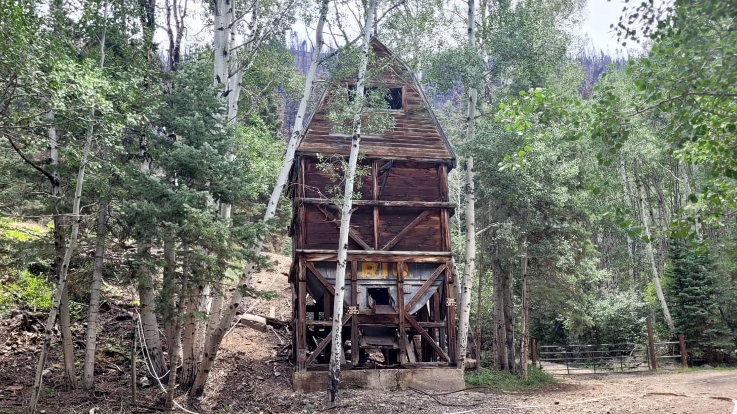 An old mining mill in a forest.