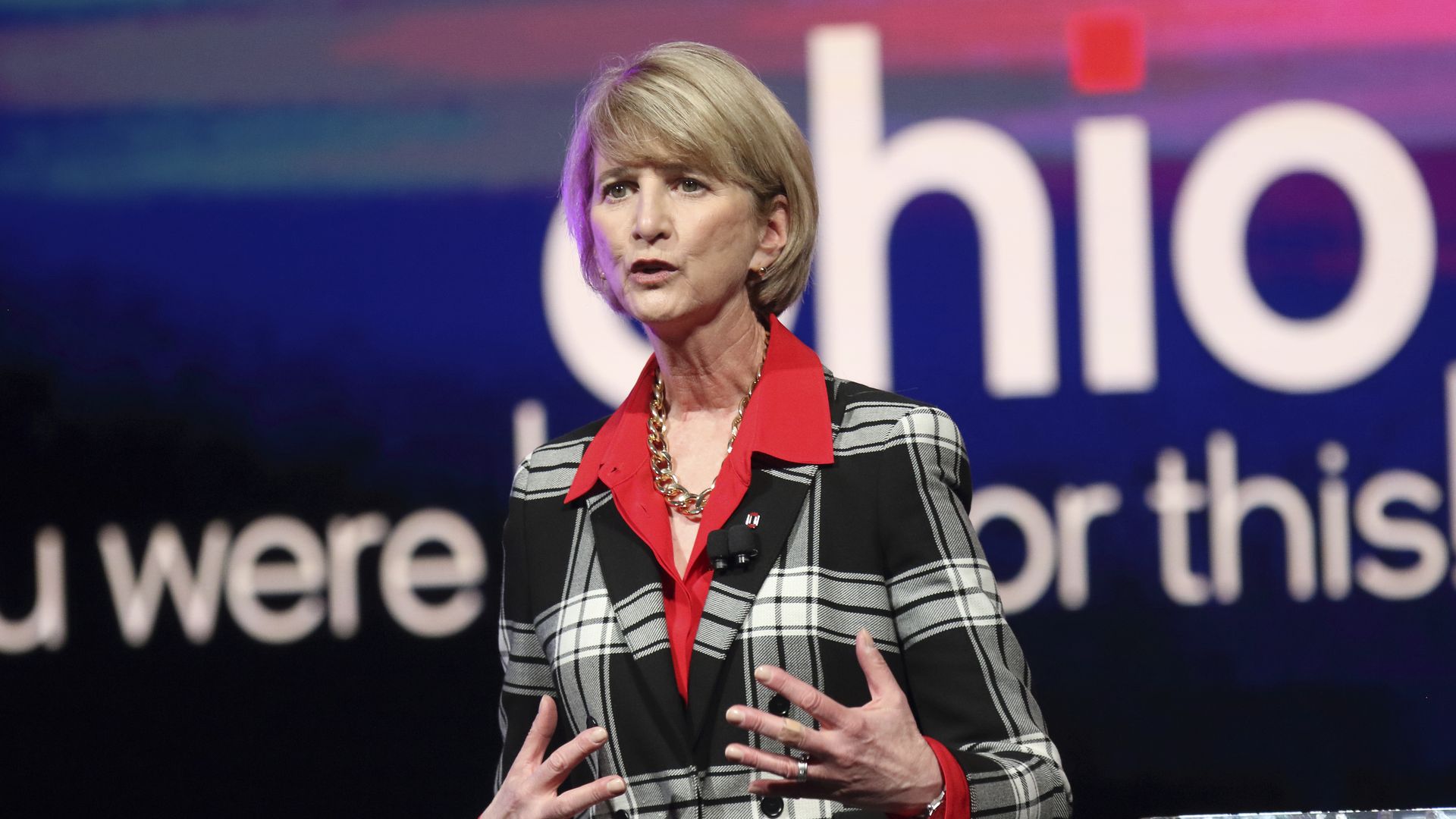 OSU president Kristina Johnson speaking on stage during an Intel investment announcement.