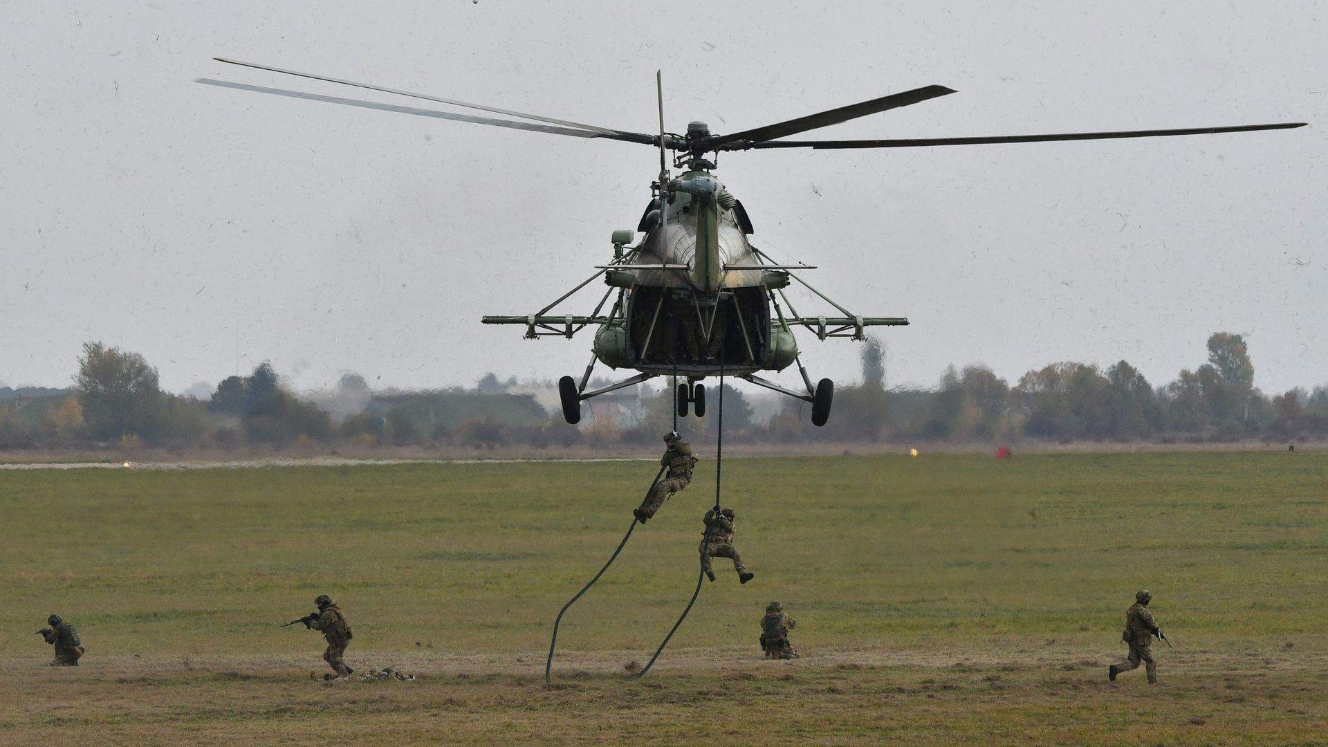 Ukrainian troops are seen exiting a helicopter while training with U.S. and NATO forces in 2018.