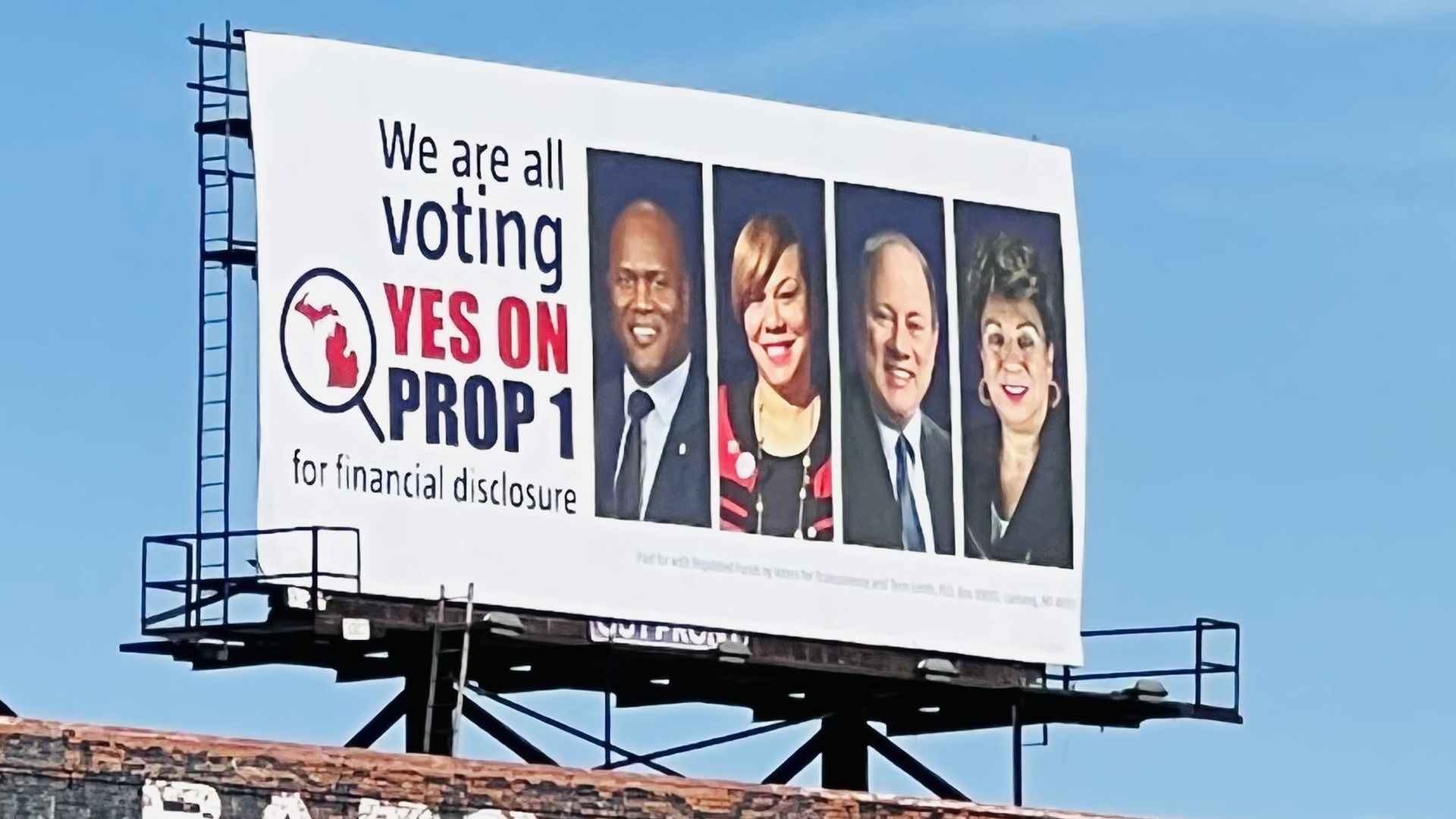 A pro-Prop 1 billboard featuring Mayor Mike Duggan