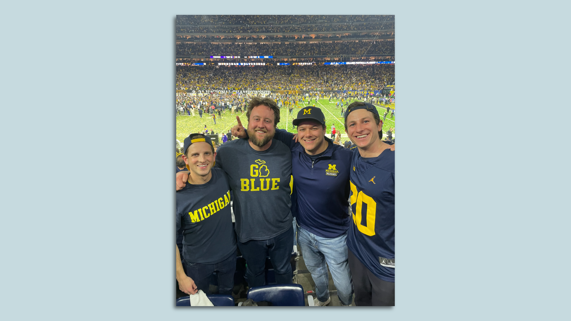 Everett poses with friends at the historic U of M game.