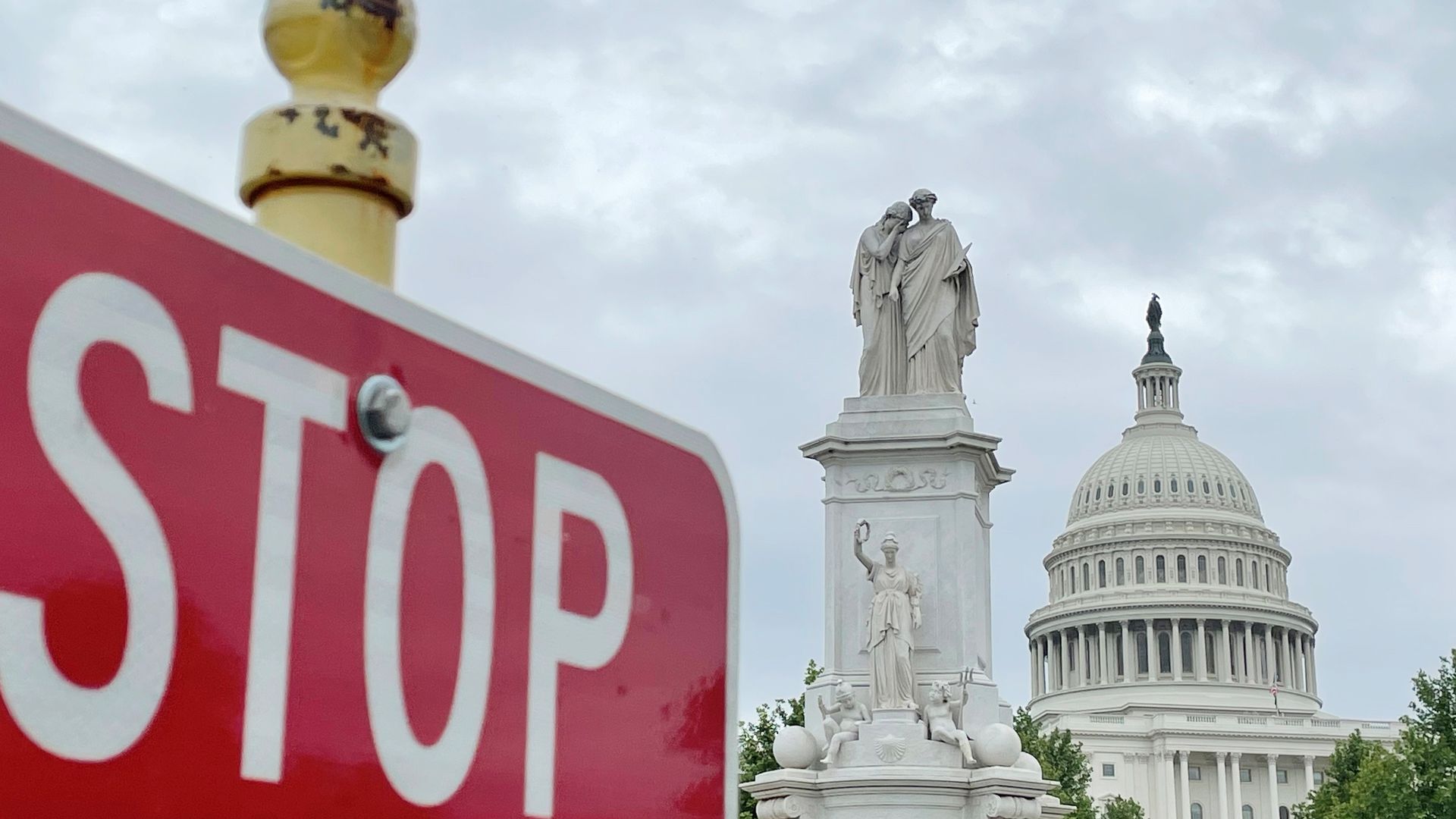 Capitol with STOP sign near by