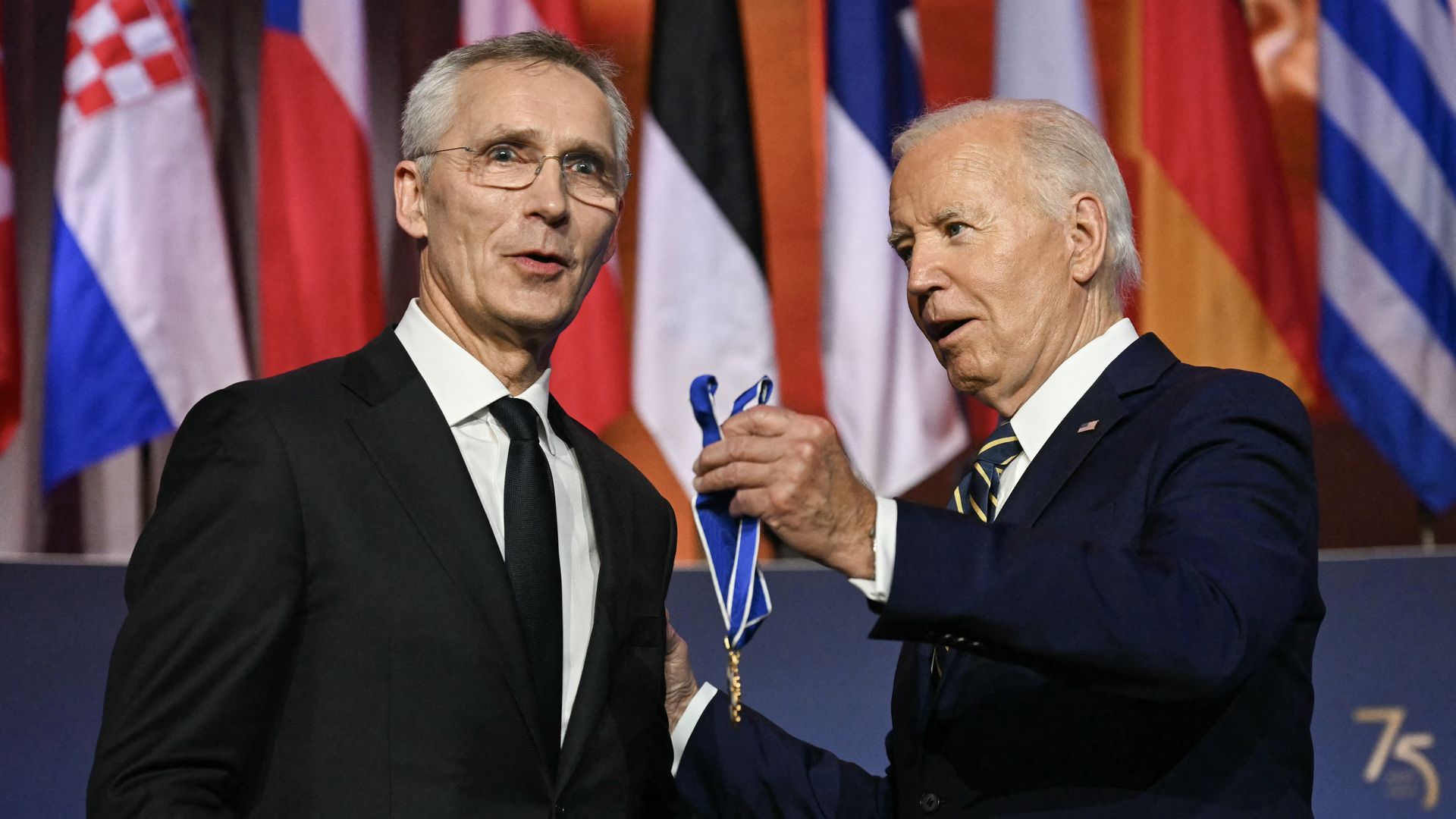  President Joe Biden (R) awards the Presidential Medal of Freedom to NATO Secretary General Jens Stoltenberg (L) during the NATO 75th Anniversary Celebratory Event at the Mellon Auditorium in Washington, DC, on July 9, 2024. 