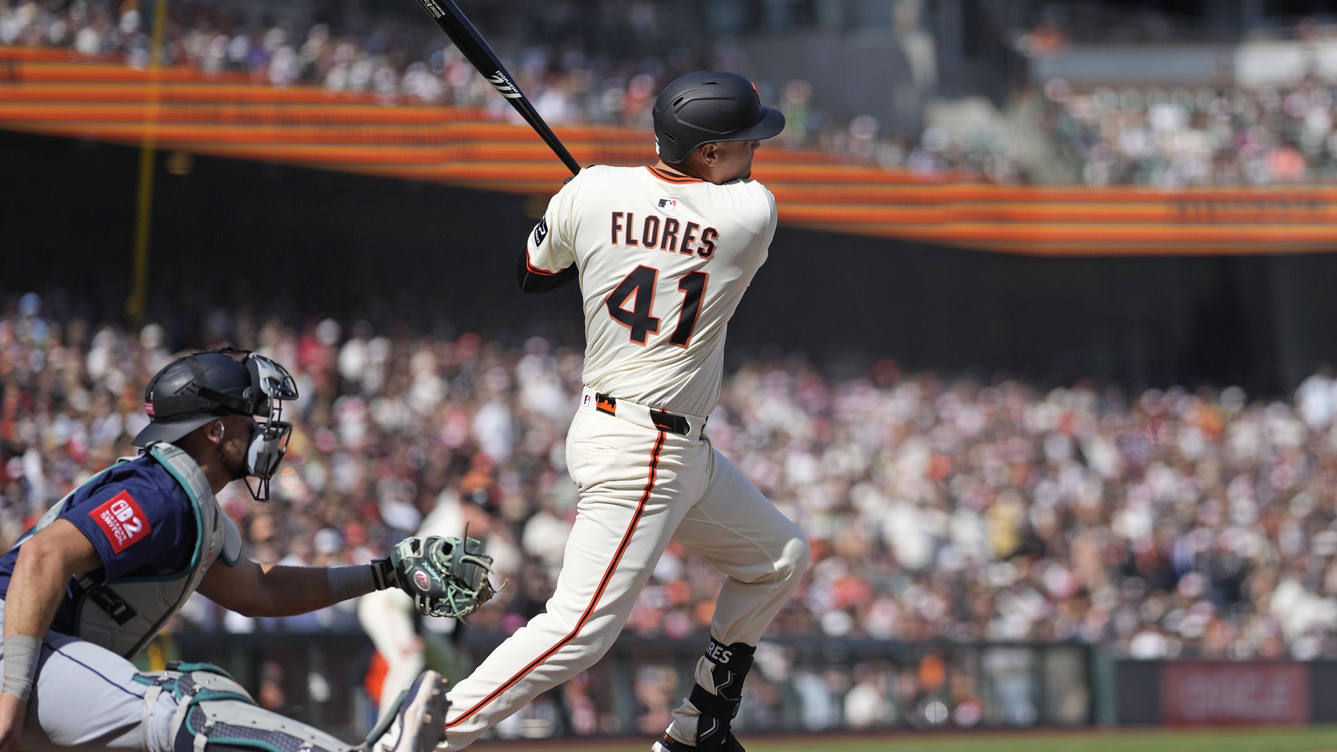 Photo of Wilmer Flores after hitting a baseball in the middle of a game in Oracle Park