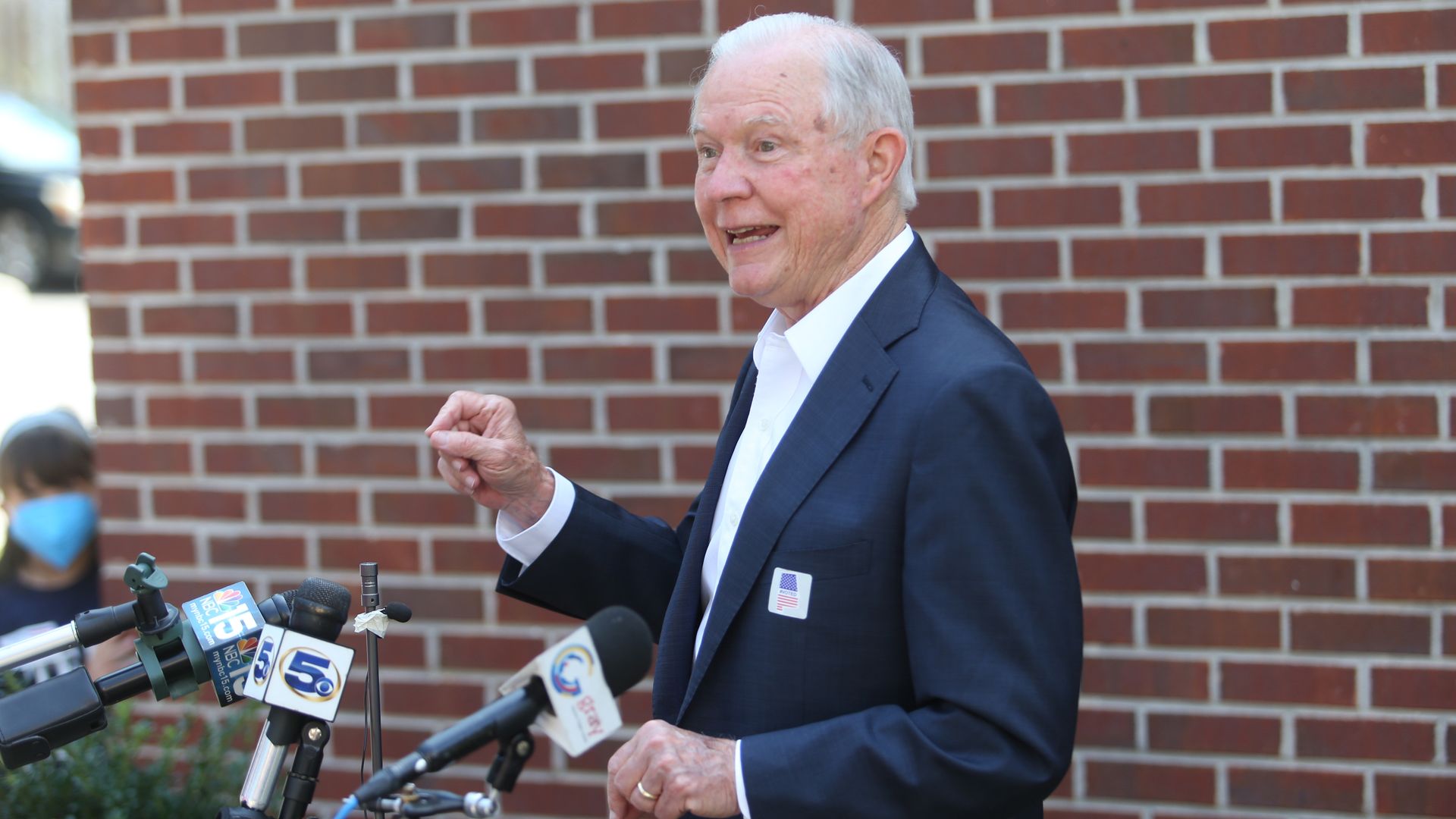 Jeff Sessions speaks with media after voting in the Republican primary in Alabama. 