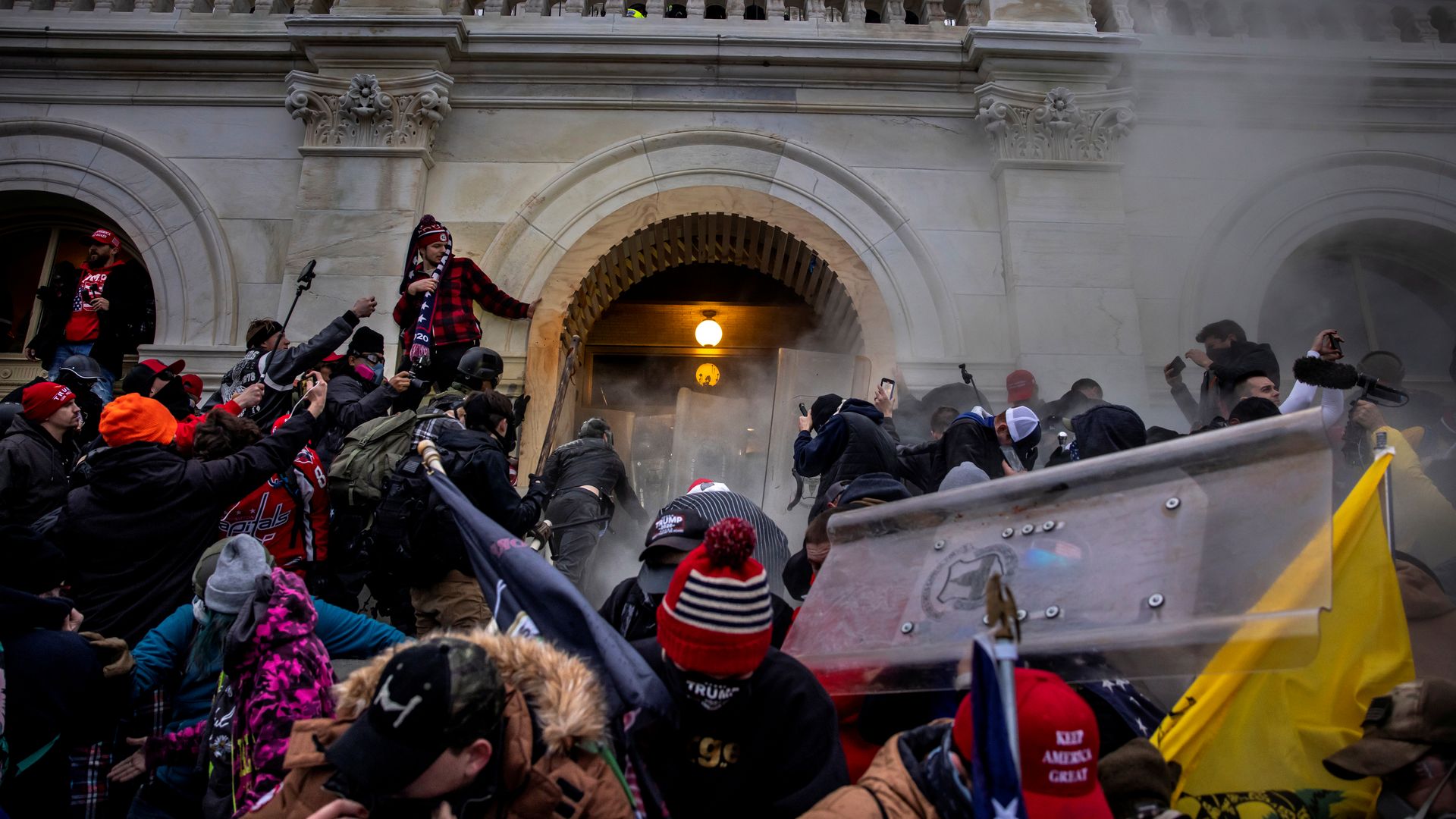 Trump supporters clash with police and security forces as people try to storm the US Capitol on January 6, 2021.